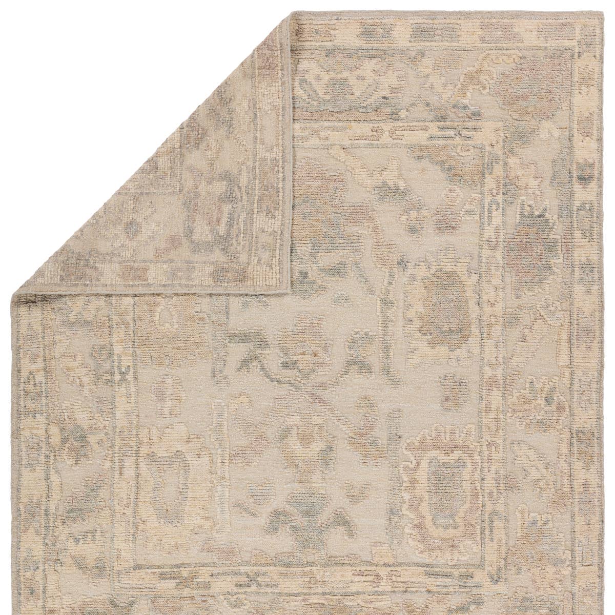 Featuring Sofi Elear Hand-Knotted Rug by Jaipur Living at Amethyst Home. The hand-ktted Sofi collection offers a textural refresh to traditional Oushak designs. With soft, tonal hues and a one-of-kind construction that creates stunning variation in color, these open and inviting designs balance the artistry of traditional textiles and the versatile aesthetic . Amethyst Home provides interior design, new home construction design consulting, vintage area rugs, and lighting in the Houston metro area.