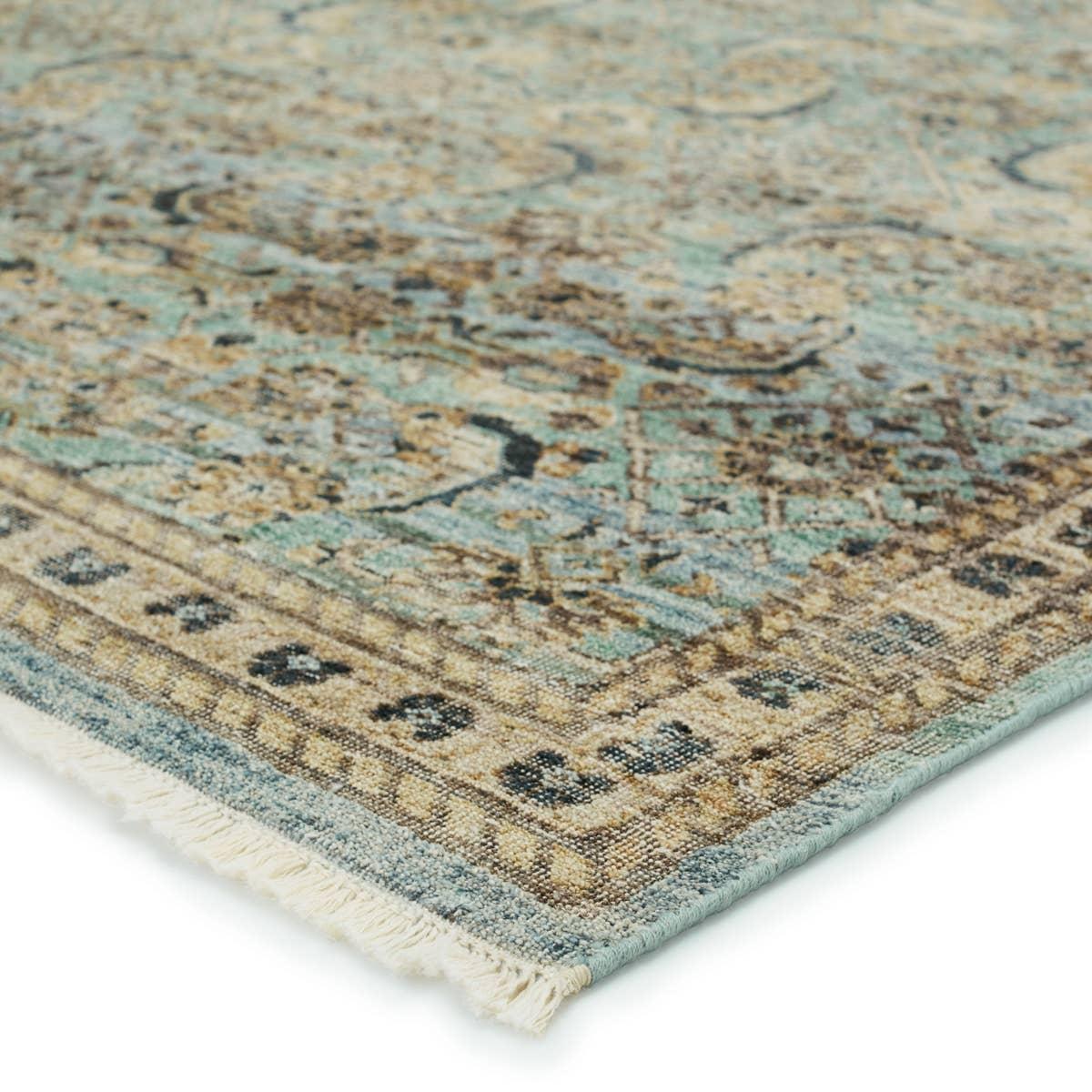 Featuring Someplace In Time Chantay Hand-Knotted Rug by Jaipur Living at Amethyst Home. Whimsical colorways combine with the opulent detail of a traditional-inspired pattern; the Someplace in Time Chantay represents nostalgia and progression, heritage and the contemporary. The Chantay rug's cool blue, green, golden tan, and black details ground spaces wit. Amethyst Home provides interior design, new home construction design consulting, vintage area rugs, and lighting in the Los Angeles metro area.