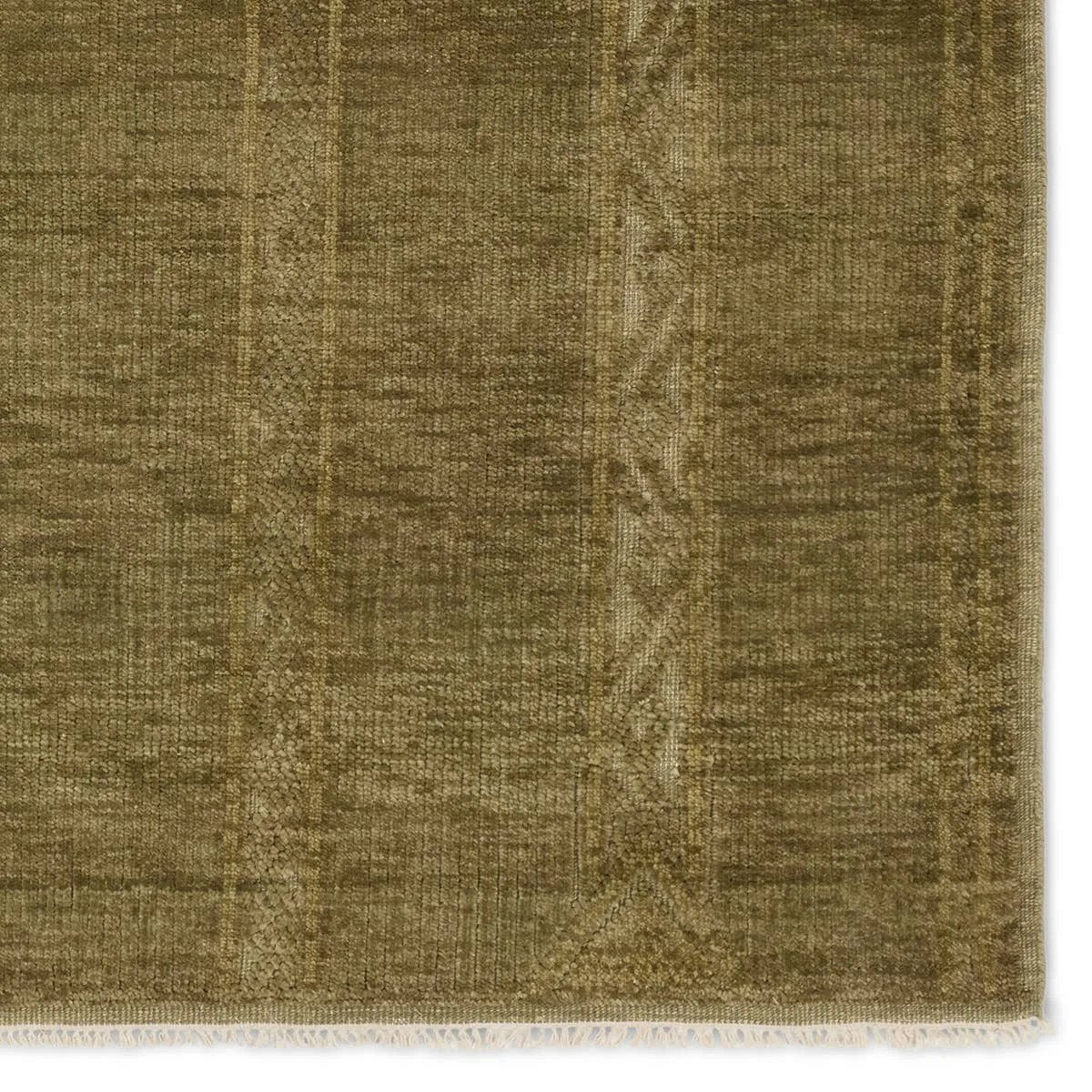 Featuring Tapeten Achala Hand-Knotted Rug by Jaipur Living at Amethyst Home. The hand-knotted Tapeten Achala features globally inspired designs that evoke a balance of tradition and modernity. The Achala pattern stuns with a high-low effect that distinguishes the olive green, geometric, striped pattern. Naturally water- and stain-resistant, the 100% wool . Amethyst Home provides interior design, new home construction design consulting, vintage area rugs, and lighting in the Kansas City metro area.