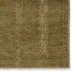 Featuring Tapeten Achala Hand-Knotted Rug by Jaipur Living at Amethyst Home. The hand-knotted Tapeten Achala features globally inspired designs that evoke a balance of tradition and modernity. The Achala pattern stuns with a high-low effect that distinguishes the olive green, geometric, striped pattern. Naturally water- and stain-resistant, the 100% wool . Amethyst Home provides interior design, new home construction design consulting, vintage area rugs, and lighting in the Kansas City metro area.