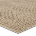Featuring Tasa Pennant Hand-Knotted Rug by Jaipur Living at Amethyst Home. The Tasa collection features intriguing designs in solid hues, hand-knotted by artisans in India for durability and quality. The Pennant rug showcases a geometric tile design created with alternating high and low piles. Short, wool pile in a natural, tan hue provides a grounding. Amethyst Home provides interior design, new home construction design consulting, vintage area rugs, and lighting in the Salt Lake City metro area.