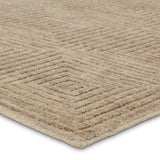 Featuring Tasa Pennant Hand-Knotted Rug by Jaipur Living at Amethyst Home. The Tasa collection features intriguing designs in solid hues, hand-knotted by artisans in India for durability and quality. The Pennant rug showcases a geometric tile design created with alternating high and low piles. Short, wool pile in a natural, tan hue provides a grounding. Amethyst Home provides interior design, new home construction design consulting, vintage area rugs, and lighting in the Salt Lake City metro area.