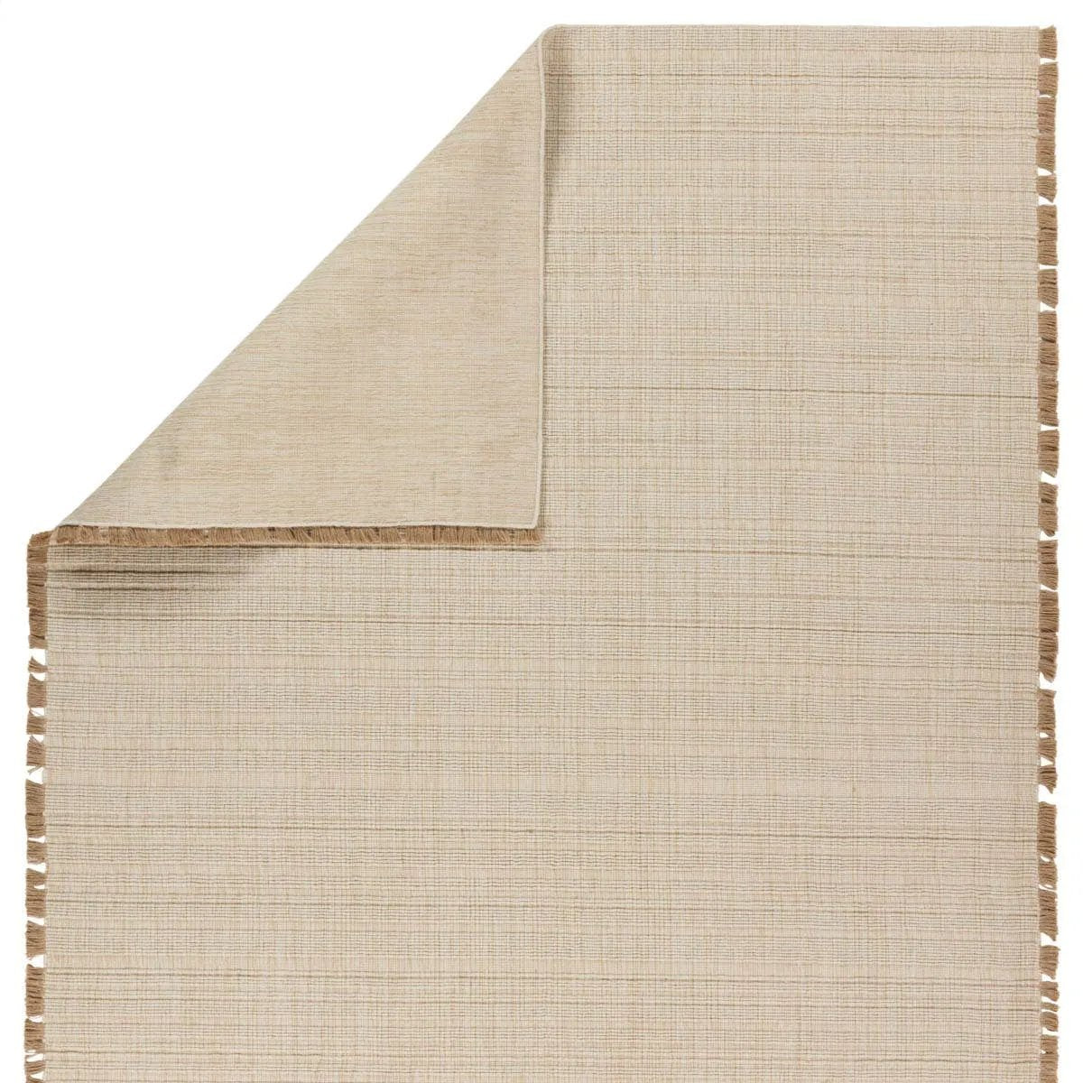 Featuring Tienne Bandera Rug by Jaipur Living at Amethyst Home. The Tienne Bandera draws inspiration from the natural world through rich texture and a wool, cotton, and jute make. Handloomed by artisans in India, these rugs exude a simple elegance suited for any modern home. The Bandera design?s cream and beige colorway provides a neutral, grounding effect in . Amethyst Home provides interior design, new home construction design consulting, vintage area rugs, and lighting in the Dallas metro area.