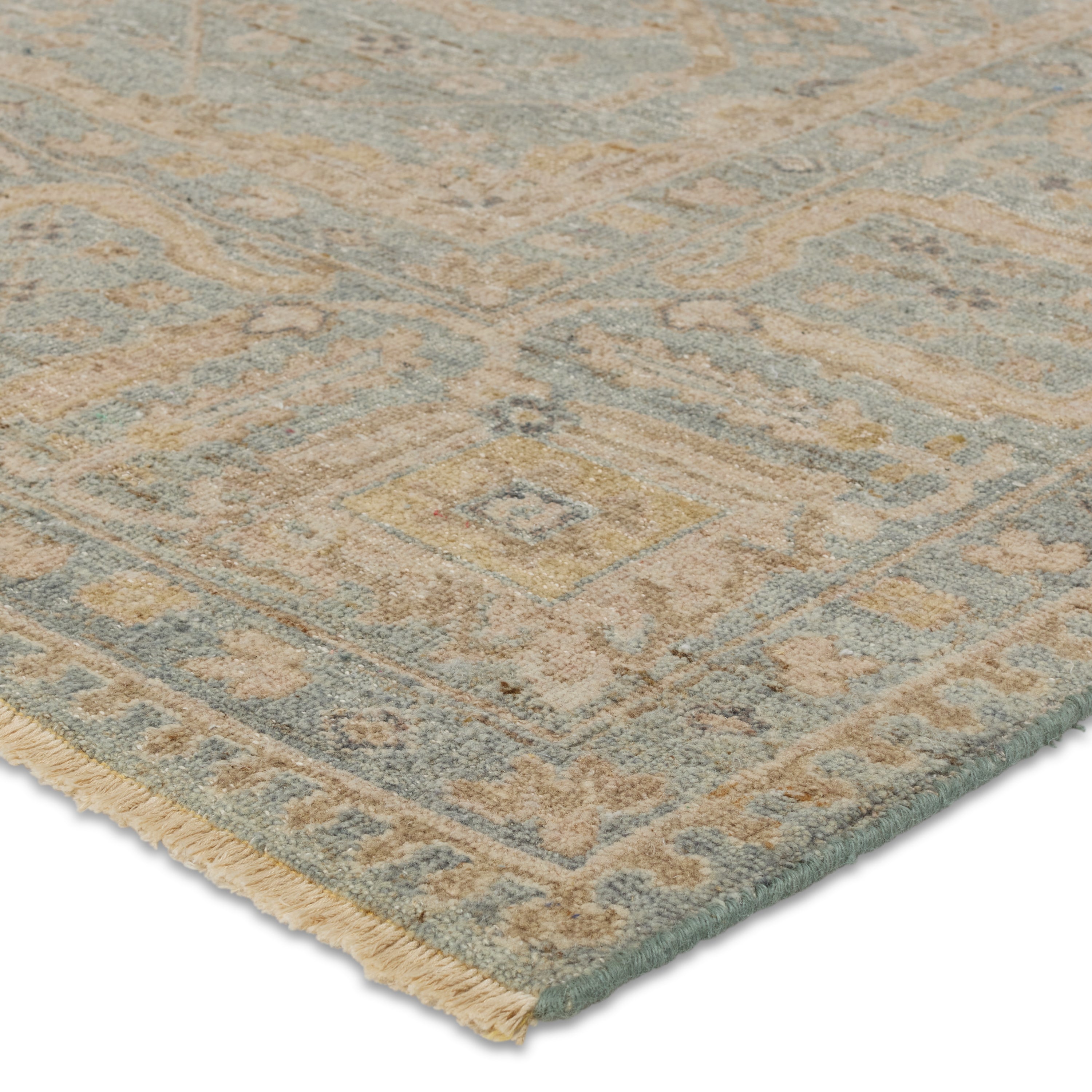 Featuring Tierzah Maison Hand-Knotted Rug by Jaipur Living at Amethyst Home. The vintage-inspired Tierzah collection features an antiqued wash and intricate traditional designs. The Maison wool rug boasts a Persian knot construction and tonal gray, tan, muted gold, and gray that grounds any space. This artisan-made rug features fringe trimmed details for a touch of global charm . Amethyst Home provides interior design, new construction, custom furniture, and area rugs in the Washington metro area.