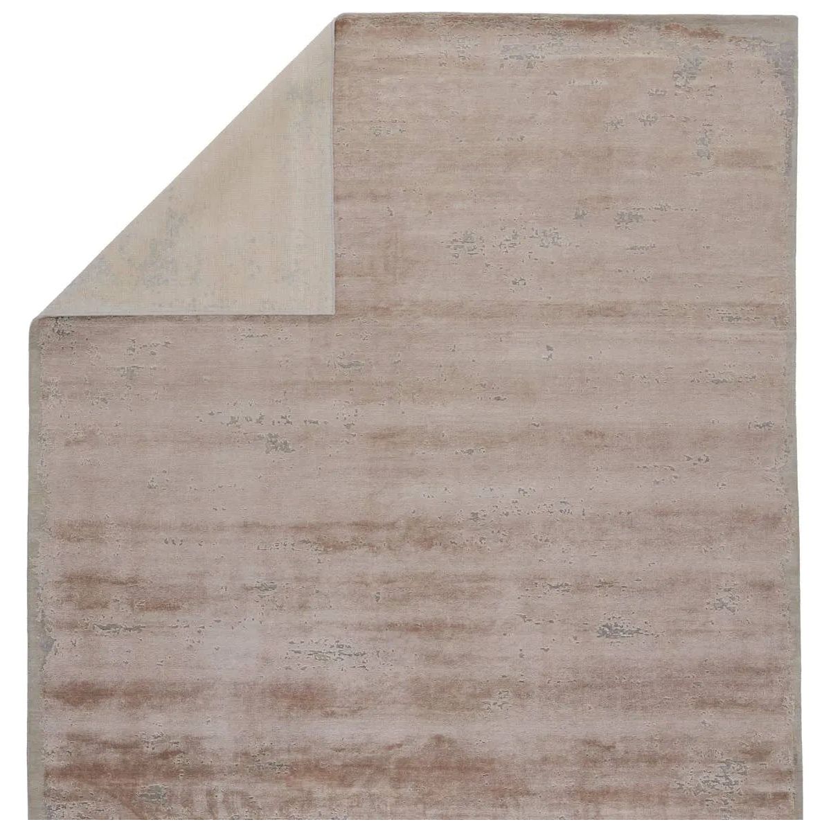 Featuring Urban Pause Olga Hand-Knotted Rug by Jaipur Living at Amethyst Home. Inspired by the unrushed quality of the natural process, the Urban Pause collection features an assortment of grounding solid designs that are anything but basic. Rayon made from bamboo lends an inviting, silk-like texture and unique light-to-dark effect to the hand-knotted quality.. Amethyst Home provides interior design, new home construction design consulting, vintage area rugs, and lighting in the Boston metro area.