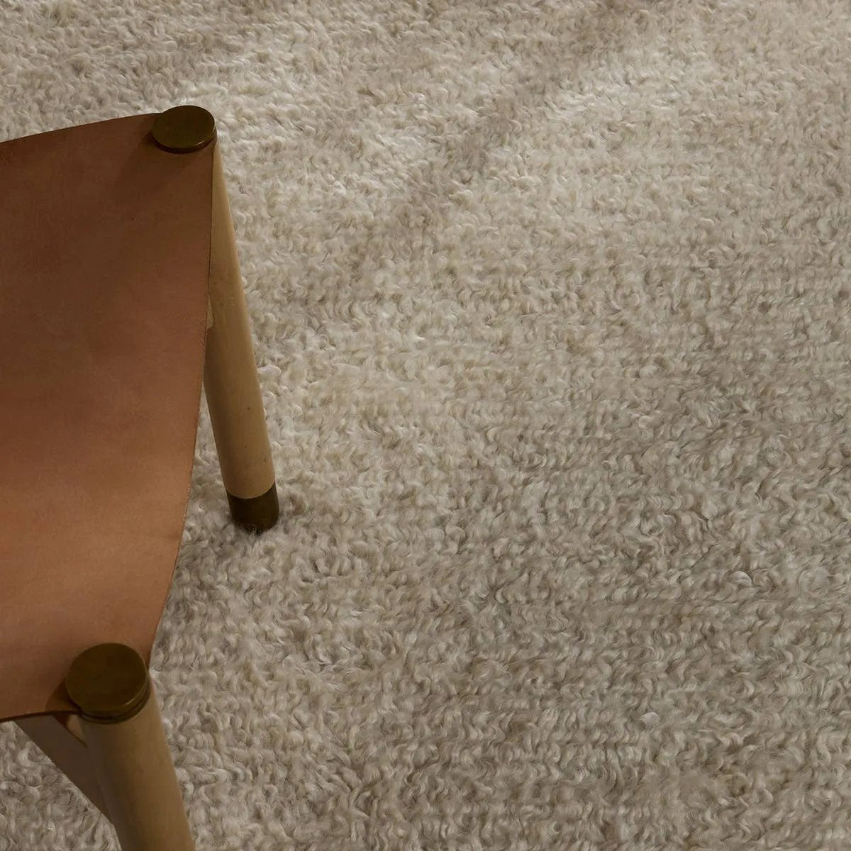 Featuring Vivre Dulcet Hand-Knotted Rug by Jaipur Living at Amethyst Home. The exceptionally fine and soft fibers of the 100% Cashmere Vivre Dulcet redefine sophistication, delivering an exquisite underfoot that exudes warmth and indulgence. This hand knotted masterpiece is best suited for low-traffic areas, ensuring its perfection remains untouched by the hust. Amethyst Home provides interior design, new home construction design consulting, vintage area rugs, and lighting in the Tampa metro area.