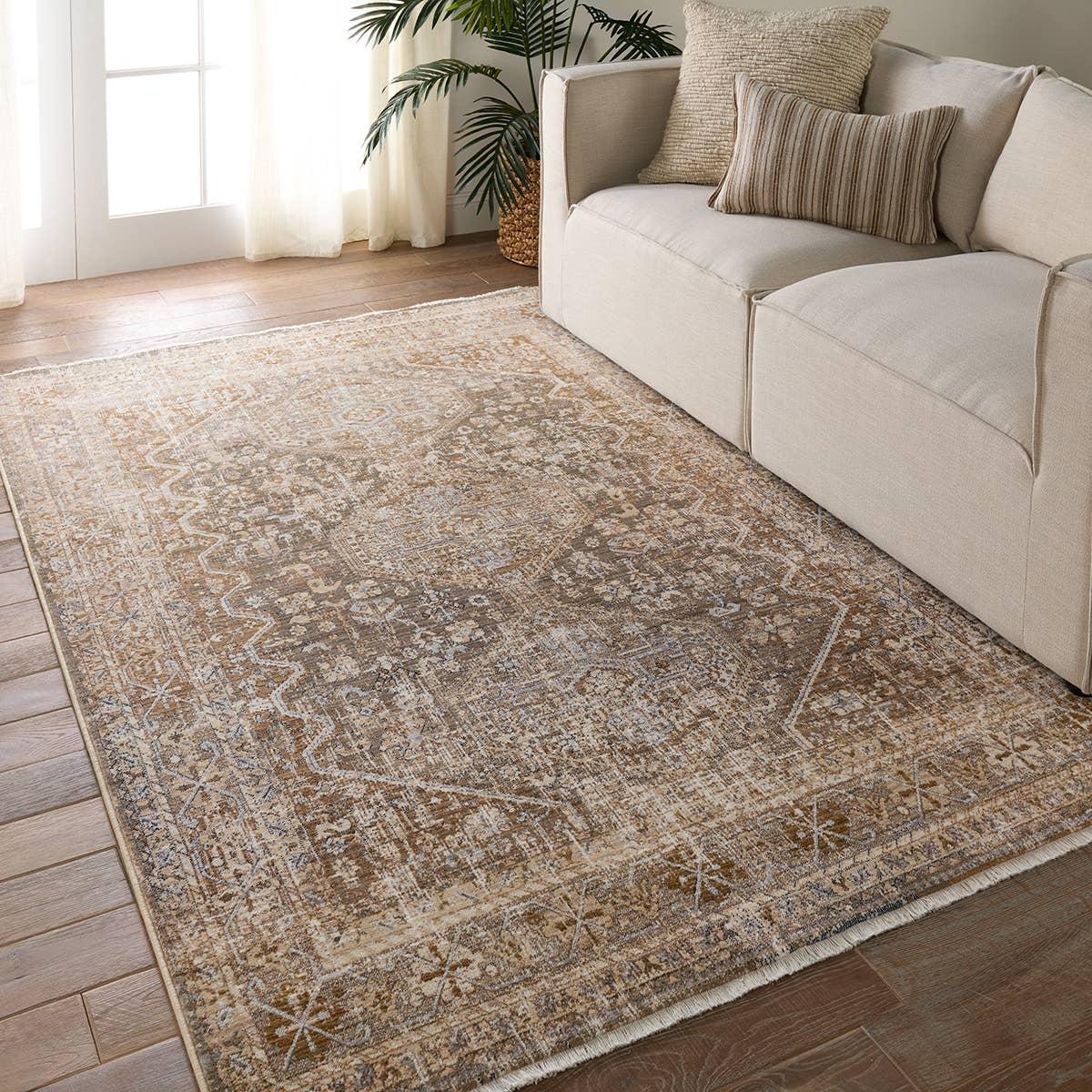 Featuring Zefira Zakaria Rug by Jaipur Living at Amethyst Home. Inspired by the vintage perfection of sun-bathed Turkish designs, the Zefira Zakaria showcases detailed traditional motifs that have been updated with on-trend, saturated colorways. The Zakaria rug boasts a distressed medallion motif in warm tones of tan, taupe, caramel, blue, and green. This powe. Amethyst Home provides interior design, new home construction design consulting, vintage area rugs, and lighting in the Dallas metro area.