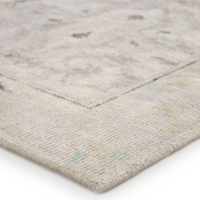 Featuring Kai Smoke/Bungee Cord Hand-Knotted Rug by Jaipur Living at Amethyst Home. When a traditional design motif is modernized and imbued with sophisticated shades of Smoke and Bungee Cord for a gently aged look, the result can only be called vintage chic. Here, Modify from the new Kai Collection is hand-knotted in 100 percent wool for exceptional quali.  Amethyst Home provides interior design, new home construction design consulting, vintage area rugs, and lighting in the Calabasas metro area.