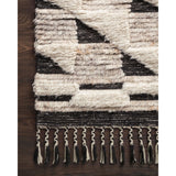 Featuring Khalid Natural/Black Hand-Knotted Rug by Loloi at Amethyst Home. A nod to timeless Moroccan style, the Khalid Collection is hand-knotted in India by skilled artisans. The soft pile features 100% natural, undyed wool, lending slight variations in tones that make each piece it's own. Plus, each rug is finished with a thoughtfully designed fringe.
Hand .  Amethyst Home provides interior design, new home construction design consulting, vintage area rugs, and lighting in the Tampa metro area.