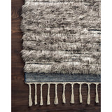 Featuring Khalid Pewter/Ink Hand-Knotted Rug by Loloi at Amethyst Home. A nod to timeless Moroccan style, the Khalid Pewter/Ink Area rug is hand-knotted in India by skilled artisans. The soft pile features 100% natural, undyed wool, lending slight variations in tones that make each piece it's own. Plus, each rug is finished with a thoughtfully designed fringe.  Amethyst Home provides interior design, new home construction design consulting, vintage area rugs, and lighting in the Austin metro area.