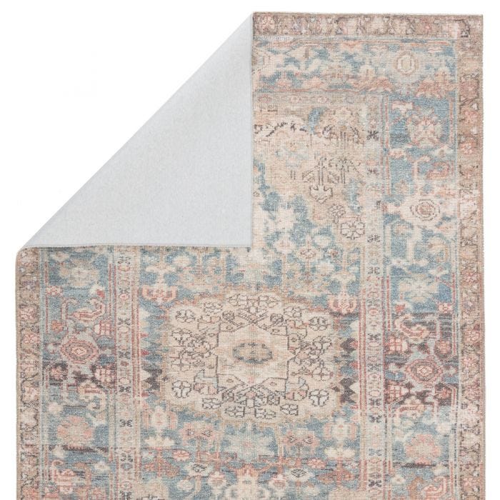 Featuring Kindred Geonna Rug by Jaipur Living at Amethyst Home. The Kindred collection melds the timelessness of vintage designs with a modern, livable style. The Geonna area rug boasts a softly faded center medallion and floral accents in subdued tones of blue, gray, beige, and blush. This low-pile rug is made of soft polyester and features a one-of-a-ki.  Amethyst Home provides interior design, new home construction design consulting, vintage area rugs, and lighting in the Scottsdale metro area.