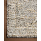 Featuring Adelaide Grey / Mist Hand-Knotted Rug by Loloi at Amethyst Home. The Adelaide Collection is a cool-toned area rug with asymmetrical motifs that float across the soft wool surface. Restrained in color and dynamic in texture, Adelaide’s variable pile height adds subtle dimension as the light changes throughout the day. Hand-knotted by artisans in . Amethyst Home provides interior design, new home construction design consulting, vintage area rugs, and lighting in the Charlotte metro area.