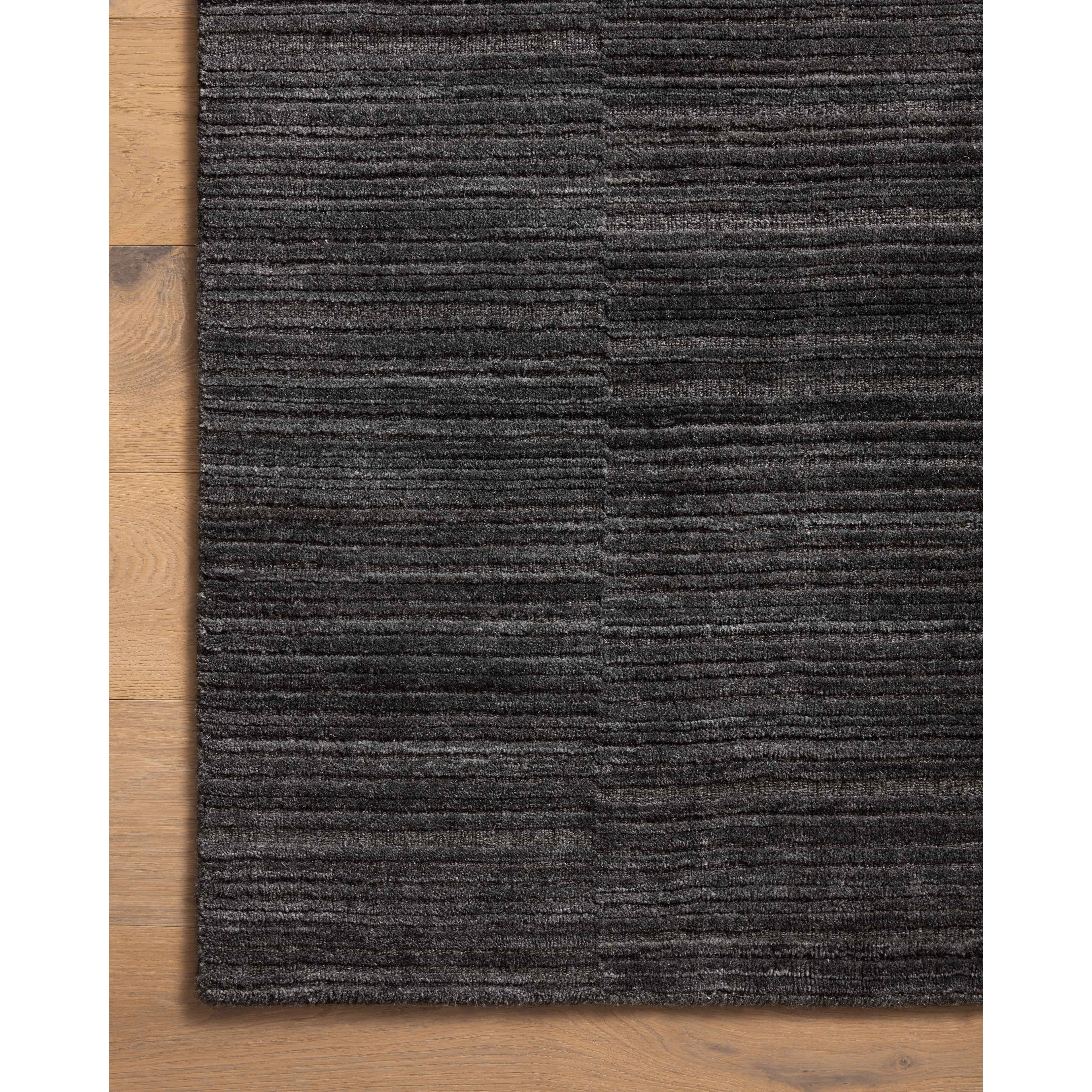 Featuring Amber Lewis x Loloi Lou Charcoal Rug by Loloi at Amethyst Home. Sleek and modern, the Lou Collection is a luxurious hand-loomed area rug by Amber Lewis x Loloi. While the rug presents a minimal aesthetic, up close, it has a broken stripe pattern that creates a slightly ribbed effect. It’s made with a blend of wool and viscose that’s soft and durab. Amethyst Home provides interior design, new home construction design consulting, vintage area rugs, and lighting in the Calabasas metro area.