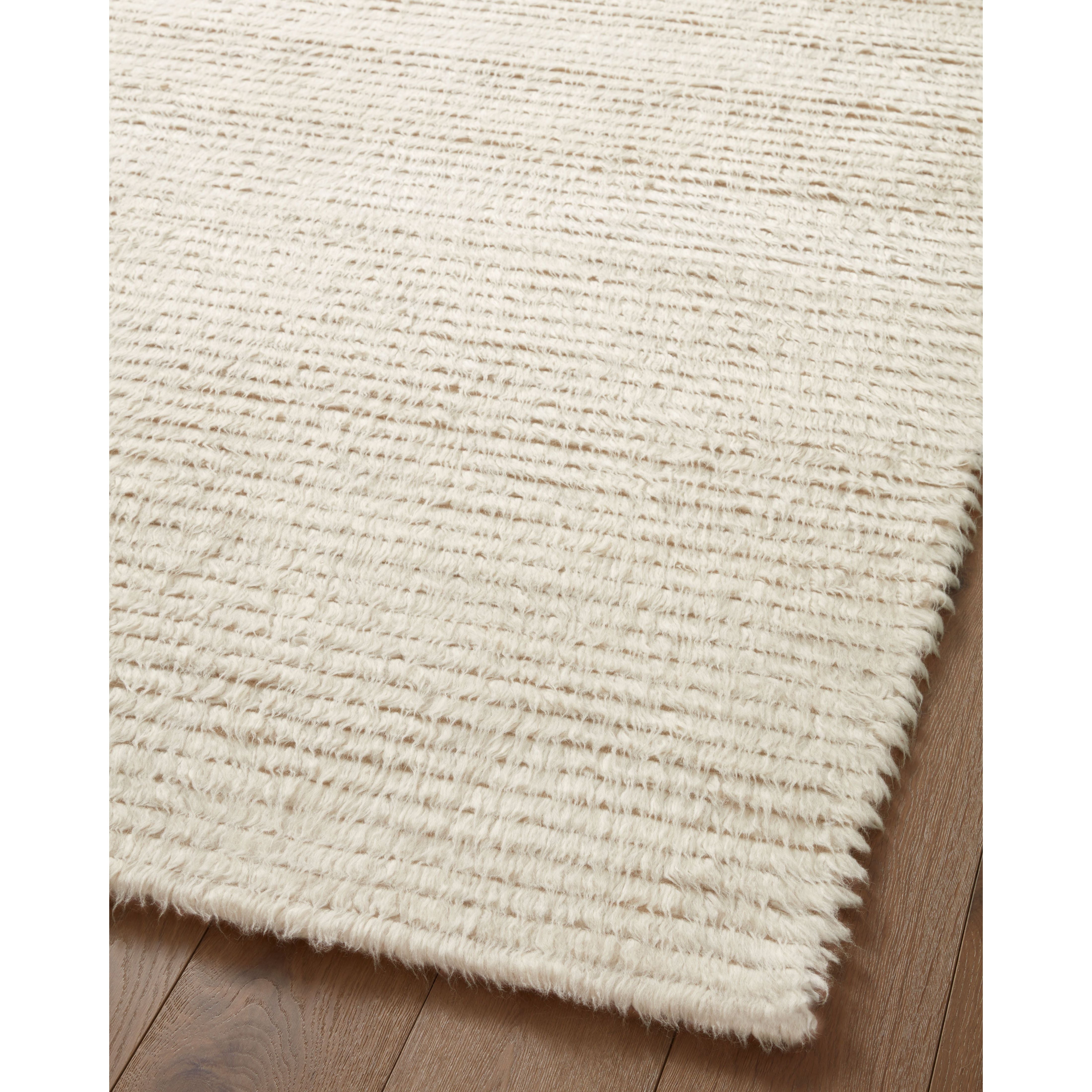 Featuring Amber Lewis x Loloi Woodland Ivory Rug by Loloi at Amethyst Home. The Amber Lewis x Loloi Woodland Ivory Rug has a lush, soft pile inspired by the tree-lined city of Woodland, California. A slightly ridged construction adds dimension and movement to this stylish, modern rug. Hand-knotted by artisans in India, the Woodland Collection is GoodWeave certified, ensuring our commitmen. Amethyst Home provides interior design services, furniture, rugs, and lighting in the Kansas City metro area.