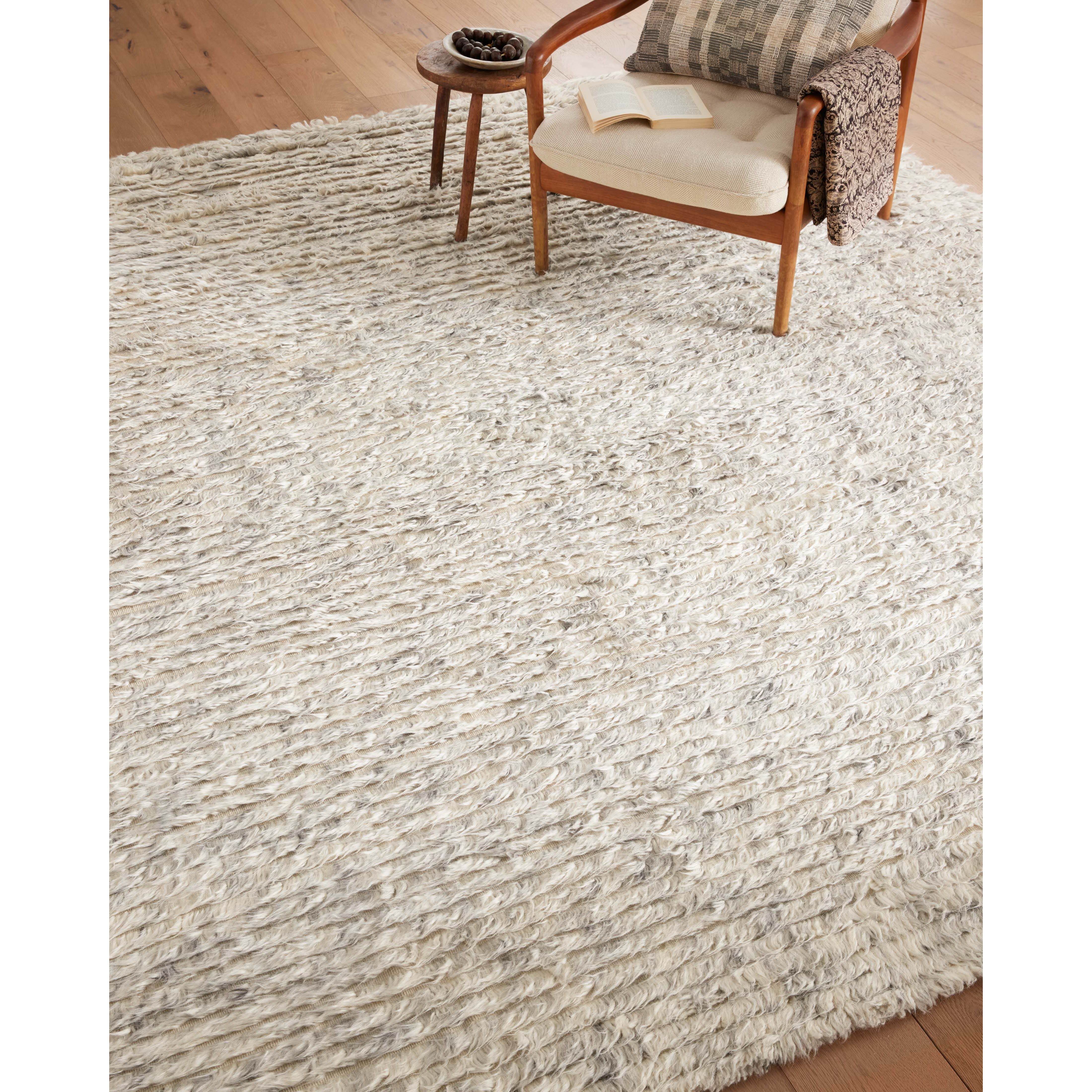 Featuring Amber Lewis x Loloi Woodland Silver Rug by Loloi at Amethyst Home. The Amber Lewis x Loloi Woodland Silver Rug has a lush, soft pile inspired by the tree-lined city of Woodland, California. A slightly ridged construction adds dimension and movement to this stylish, modern rug. Hand-knotted by artisans in India, the Woodland Collection is GoodWeave certified, ensuring our commitment t. Amethyst Home provides interior design services, furniture, rugs, and lighting in the Dallas metro area.