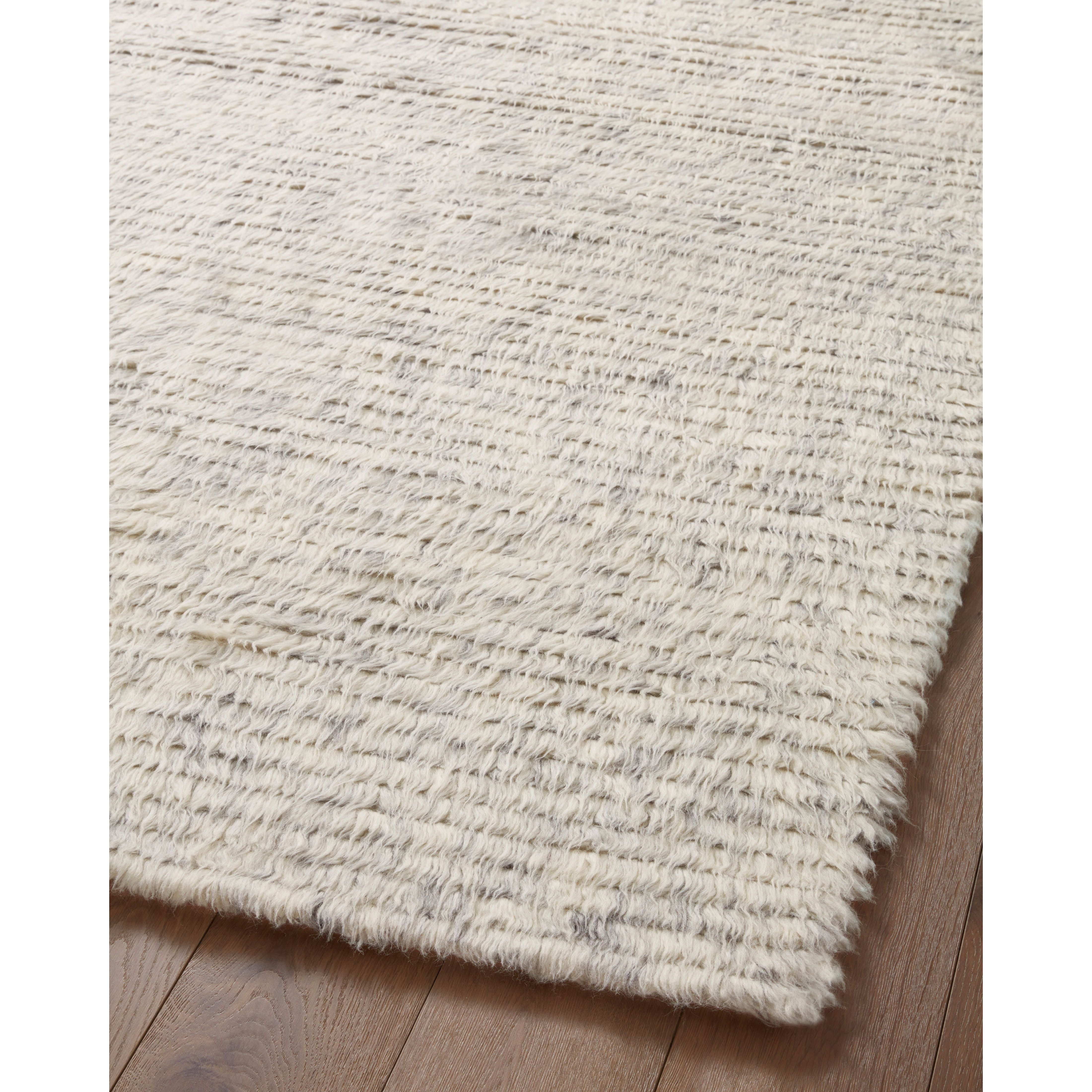 Featuring Amber Lewis x Loloi Woodland Silver Rug by Loloi at Amethyst Home. The Amber Lewis x Loloi Woodland Silver Rug has a lush, soft pile inspired by the tree-lined city of Woodland, California. A slightly ridged construction adds dimension and movement to this stylish, modern rug. Hand-knotted by artisans in India, the Woodland Collection is GoodWeave certified, ensuring our commitm. Amethyst Home provides interior design services, furniture, rugs, and lighting in the Kansas City metro area.