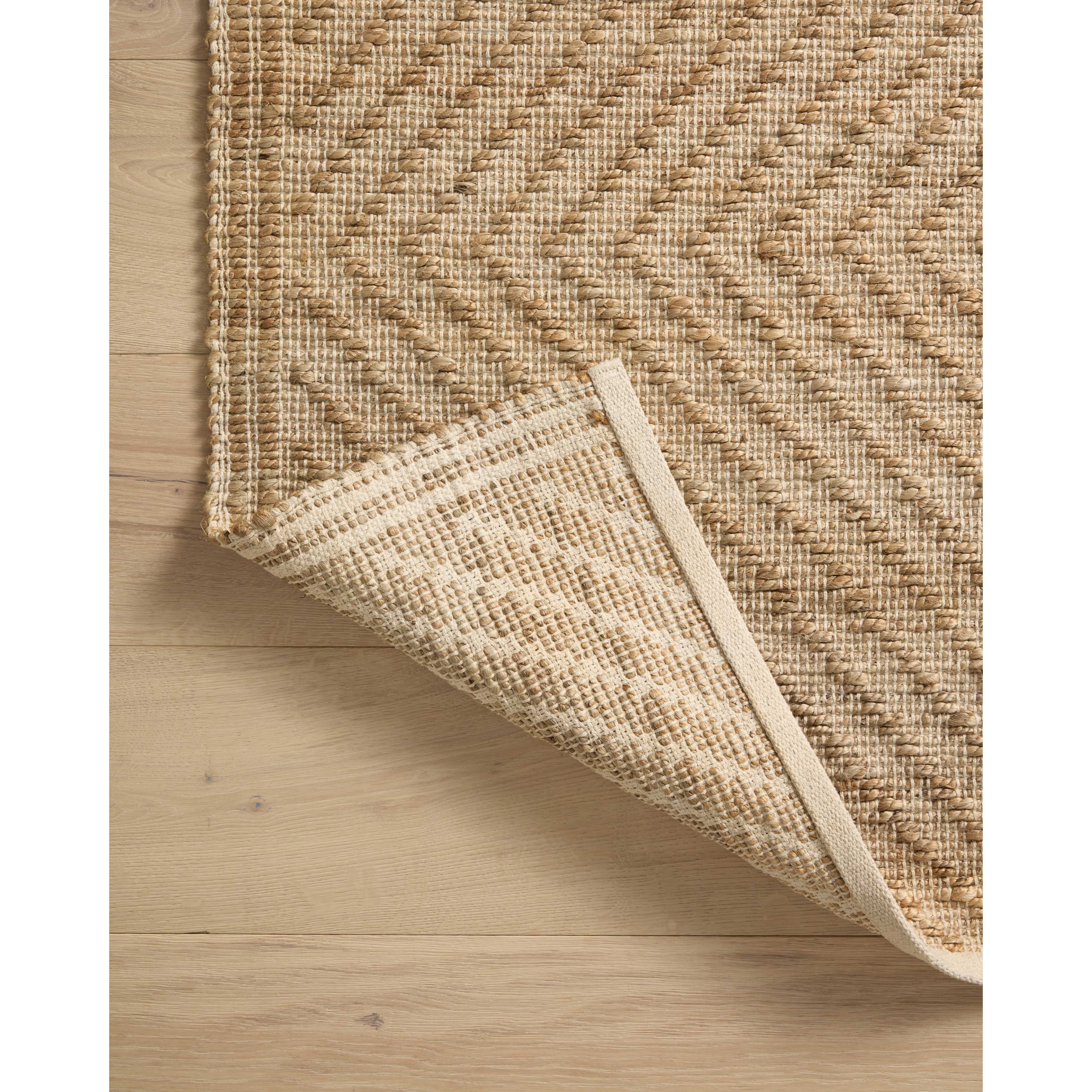 Featuring Angela Rose x Loloi Colton Natural / Ivory Rug by Loloi at Amethyst Home. The Angela Rose x Loloi Colton Natural / Ivory Rug is a new take on the staple jute rug, blended with cotton for added softness. In a range of linear designs in modern earth tones, Colton can add visual interest to a room or serve as a gently textured neutral. This collection is hand-woven in India and GoodWeave. Amethyst Home provides interior design services, furniture, rugs, and lighting in the Omaha metro area.