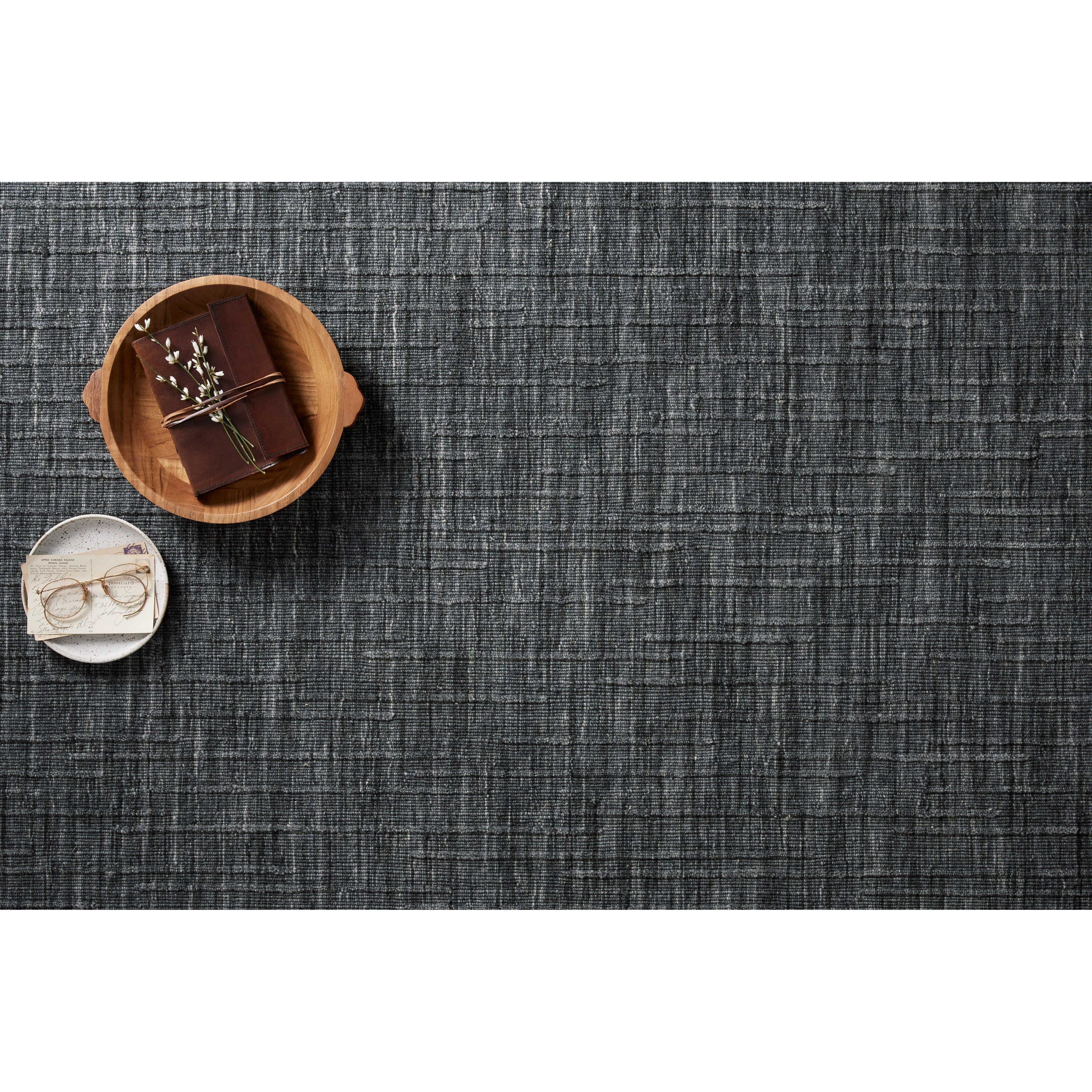 Featuring Brooks Ink Rug by Loloi at Amethyst Home. Hand-woven of wool, cotton and polyester, the Brooks Collection offers a sophisticated foundation for a contemporary refined and relaxed look. Featuring a subtle linear texture for minimalist appeal, Brooks is the perfect understated base. Brooks is also GoodWeave certified, ensuring our commitment to eth.  Amethyst Home provides interior design, new home construction design consulting, vintage area rugs, and lighting in the Charlotte metro area.