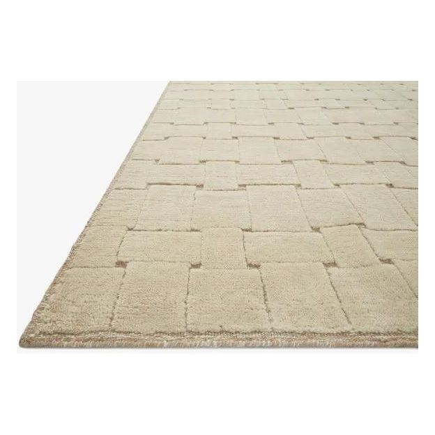 Featuring Carrier & Company x Loloi Harrison Beige / Natural Rug by Loloi at Amethyst Home. Inspired by Swedish weavings, the Harrison Collection for Carrier and Company x Loloi is a playful selection of high/low pile, where the patterns are expressed through the weaves. Linear patterns help create order and clarity in a room, and the repetition in the patt. Amethyst Home provides interior design, new home construction design consulting, vintage area rugs, and lighting in the Charlotte metro area.