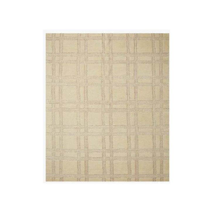 Featuring Carrier & Company x Loloi Milton Wheat / Natural Rug by Loloi at Amethyst Home. Made in collaboration with Carrier and Company x Loloi, the Milton Collection uses a banding detail to express the rich and plush pile. The addition of jute to the wool and cotton rugs creates a luxurious density that can be both seen and felt. As a simple border detail. Amethyst Home provides interior design, new home construction design consulting, vintage area rugs, and lighting in the Monterey metro area.