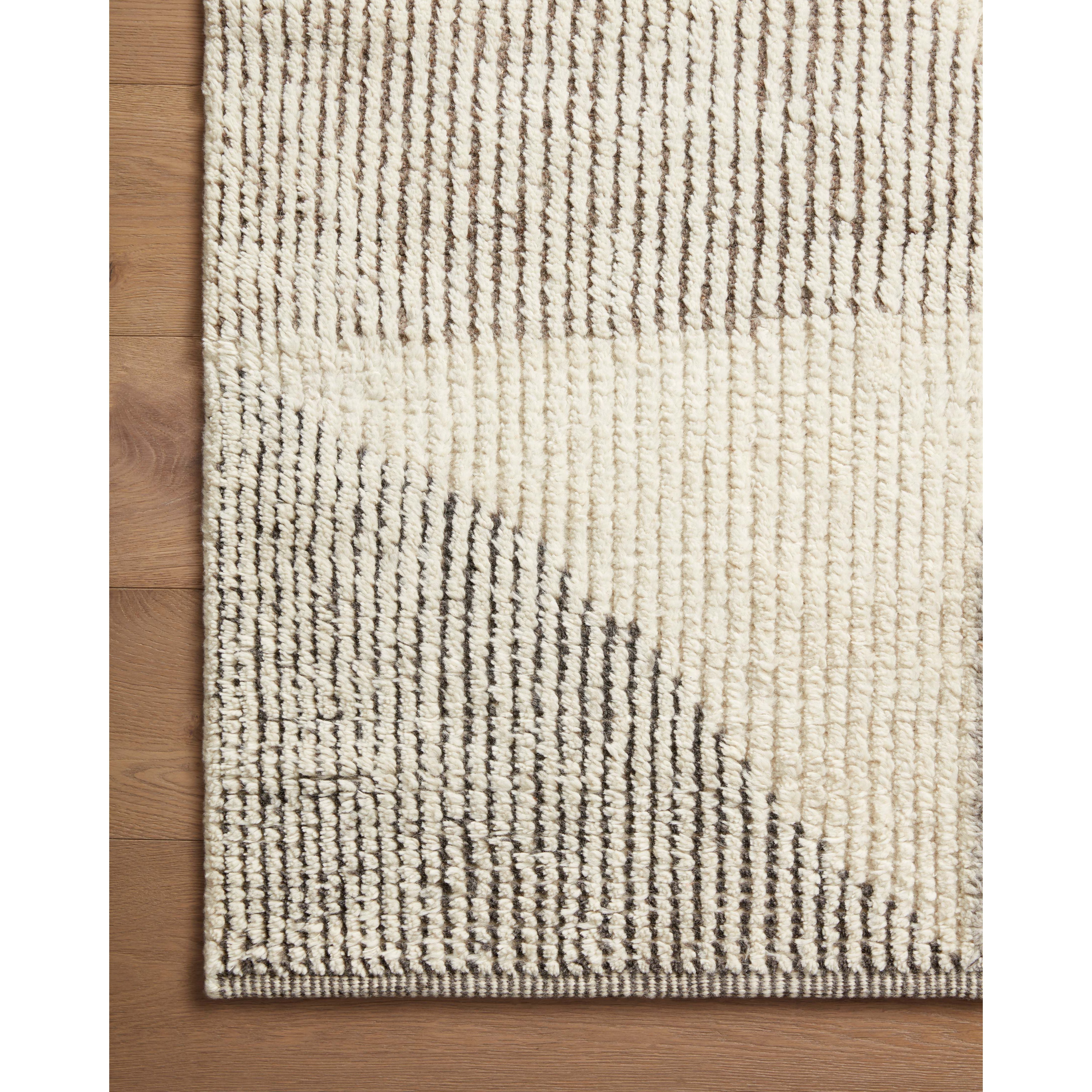 Featuring Carrier & Company x Loloi Vestry Ivory / Natural Hand-Knotted Rug by Loloi at Amethyst Home. Hand Knotted97% Wool | 3% Other FiberVES-01 Ivory / NaturalPile Height: 0.38"Clean spills immediately by blotting with a clean, white sponge or cloth. Professional cleaning recommended. Appropriate rug pad is highly recommended on all surfaces to prevent s. Amethyst Home provides interior design, new home construction design consulting, vintage area rugs, and lighting in the San Diego metro area.