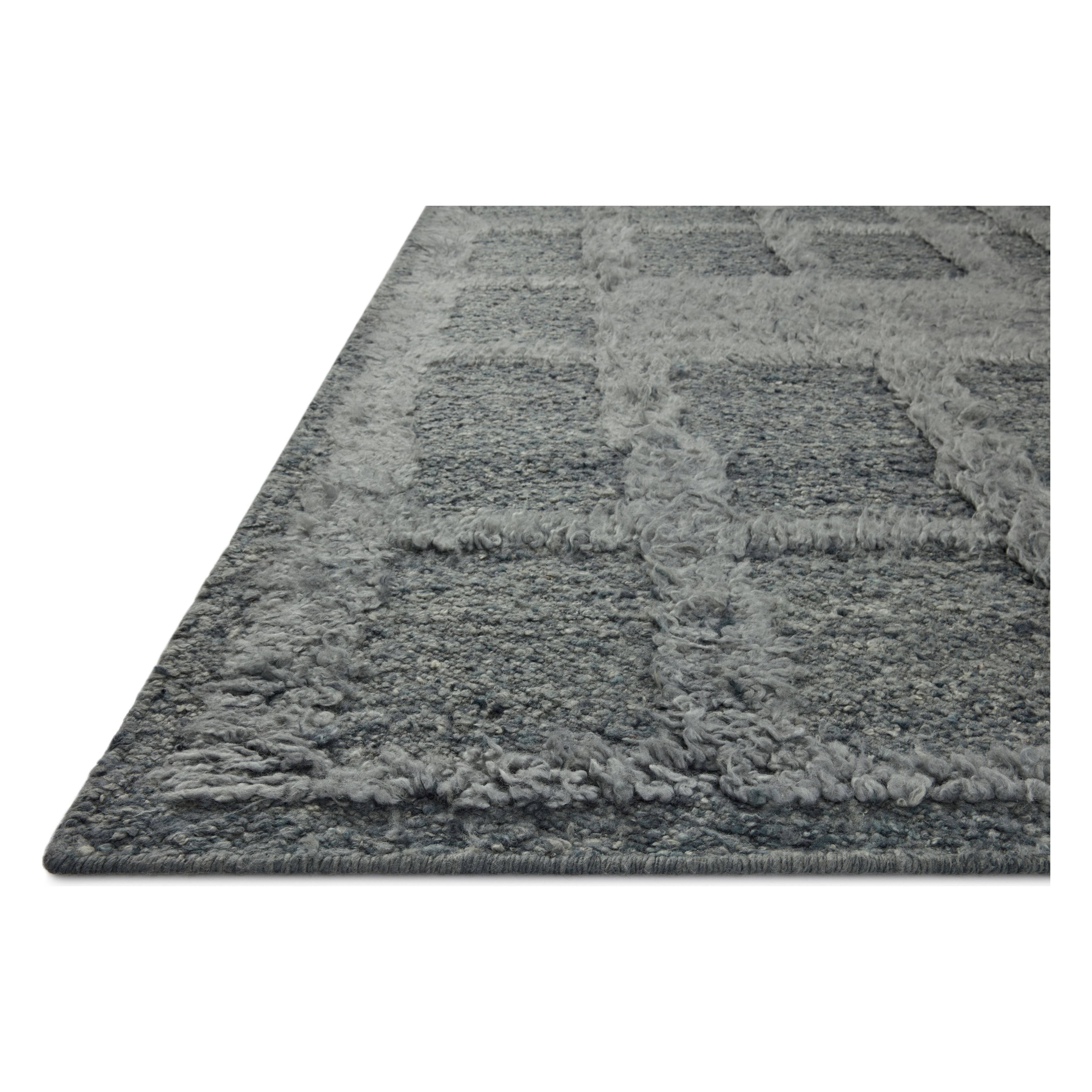 Featuring Cassian Denim Rug by Loloi at Amethyst Home. The Cassian Denim Rug is a hand-woven wool and cotton area rug with an asymmetrical gridded pattern and high-low texture. The rug’s higher, shaggy pile takes cues from Moroccan designs, while the neutral colors and natural materials make it a cozy addition to any space, especially living rooms and dens. Amethyst Home provides interior design, new home construction design consulting, vintage area rugs, and lighting in the Des Moines metro area.