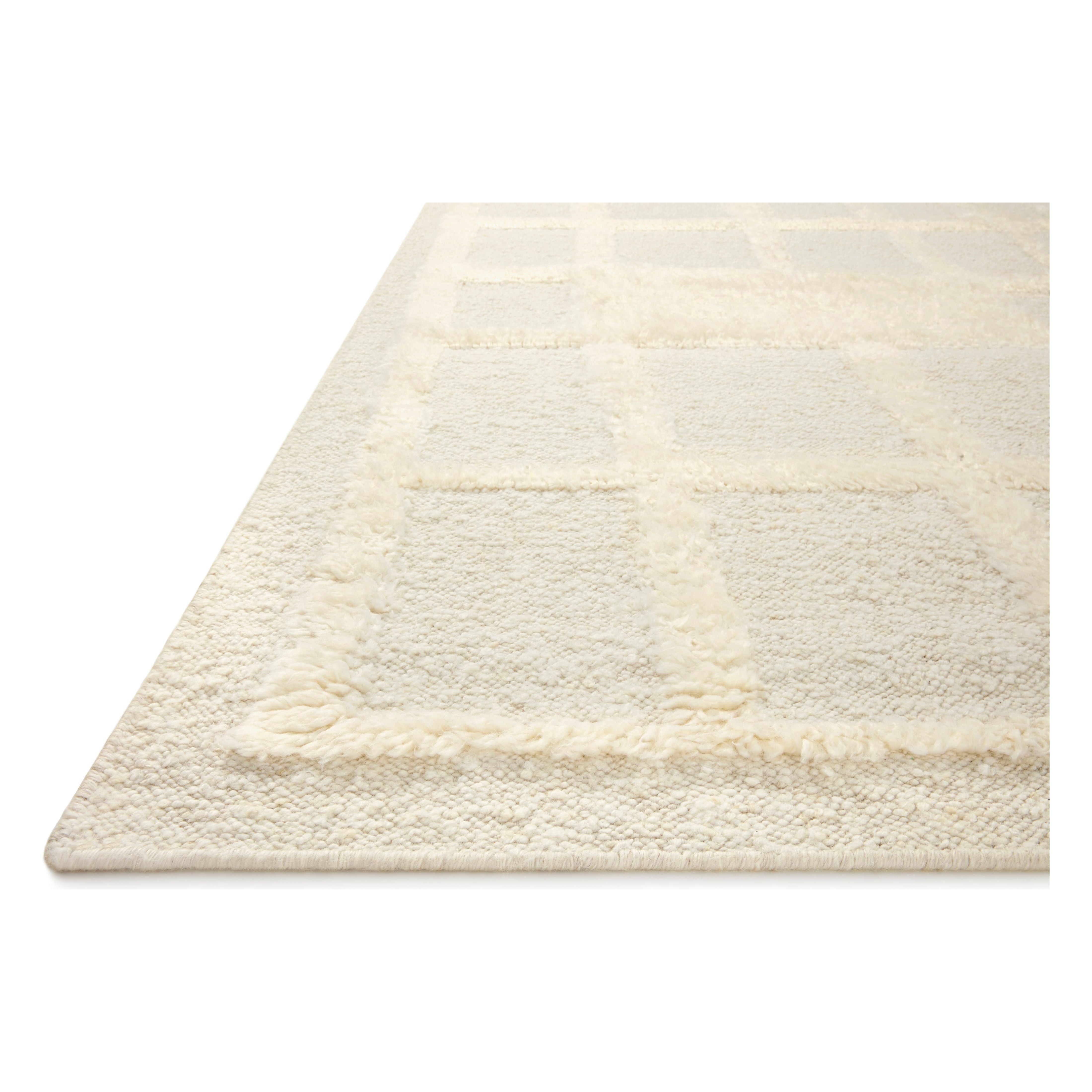 Featuring Cassian Ivory Rug by Loloi at Amethyst Home. The Cassian Ivory Rug is a hand-woven wool and cotton area rug with an asymmetrical gridded pattern and high-low texture. The rug’s higher, shaggy pile takes cues from Moroccan designs, while the neutral colors and natural materials make it a cozy addition to any space, especially living rooms and dens.. Amethyst Home provides interior design, new home construction design consulting, vintage area rugs, and lighting in the Baltimore metro area.