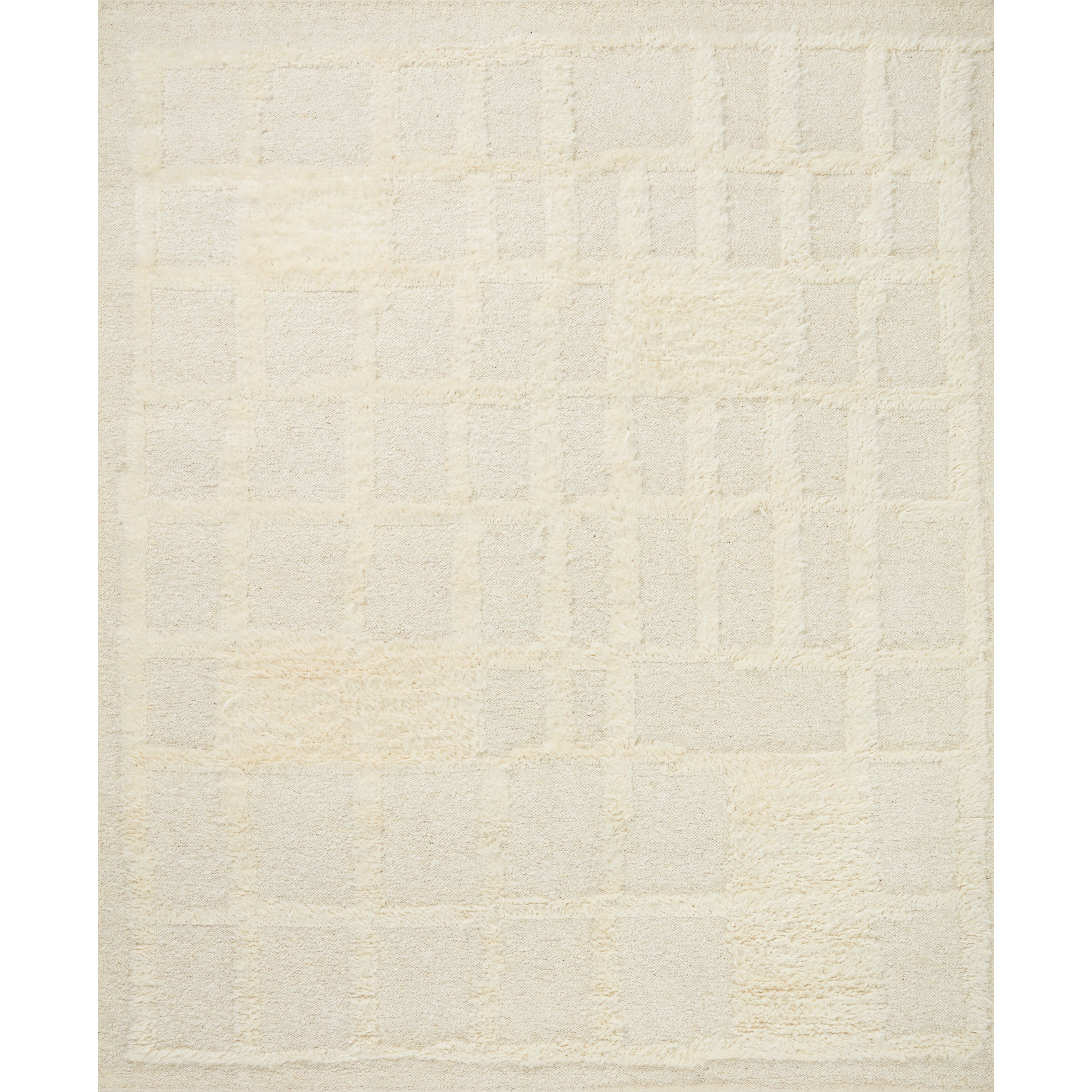 Featuring Cassian Ivory Rug by Loloi at Amethyst Home. The Cassian Ivory Rug is a hand-woven wool and cotton area rug with an asymmetrical gridded pattern and high-low texture. The rug’s higher, shaggy pile takes cues from Moroccan designs, while the neutral colors and natural materials make it a cozy addition to any space, especially living rooms and den. Amethyst Home provides interior design, new home construction design consulting, vintage area rugs, and lighting in the Kansas City metro area.