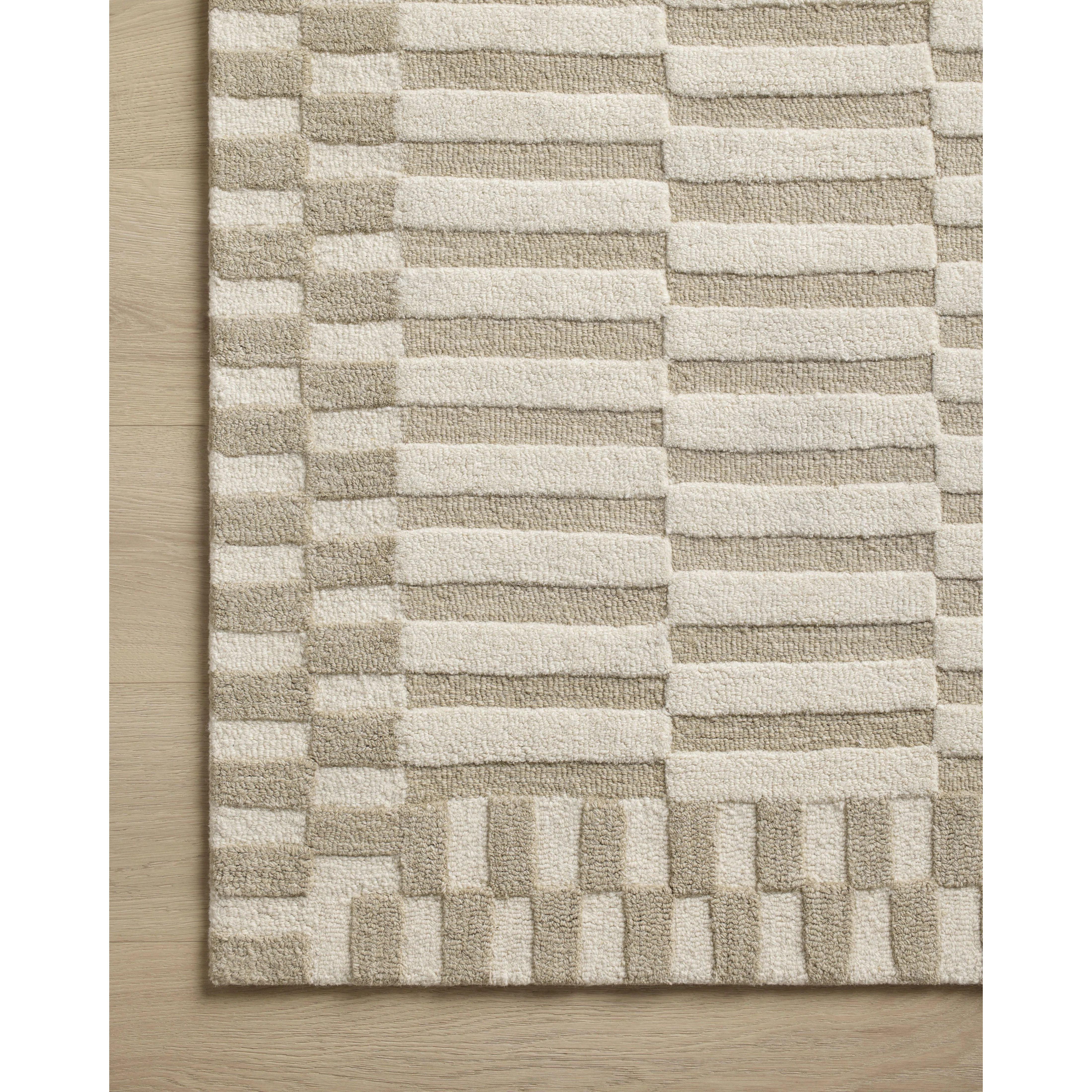 Featuring Chris Loves Julia x Loloi Bradley Ivory / Beige Rug by Loloi at Amethyst Home. The Bradley Collection from Chris Loves Julia x Loloi takes the classic striped rug to new heights. This hand-tufted, 100% wool collection features two-toned linear patterns with alternating high-low pile. Bradley is GoodWeave-certified, ensuring our commitment to ethical . Amethyst Home provides interior design, new home construction design consulting, vintage area rugs, and lighting in the Austin metro area.