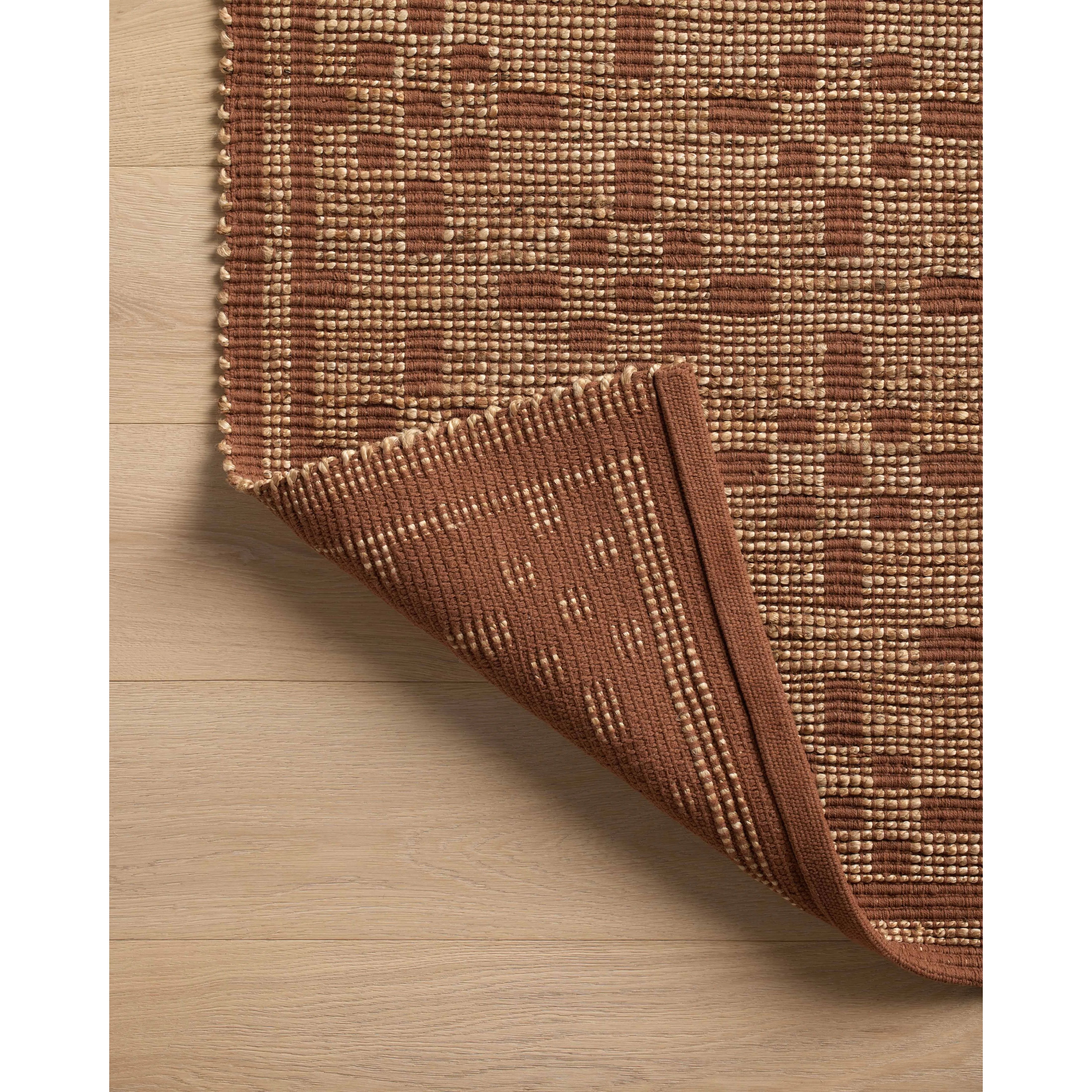 Featuring Chris Loves Julia x Loloi Judy Natural / Spice Rug by Loloi at Amethyst Home. Hand Woven76% Jute l 24% CottonJUD-07 Natural / SpicePile Height: 0.5". Amethyst Home provides interior design, new home construction design consulting, vintage area rugs, and lighting in the Kansas City metro area.