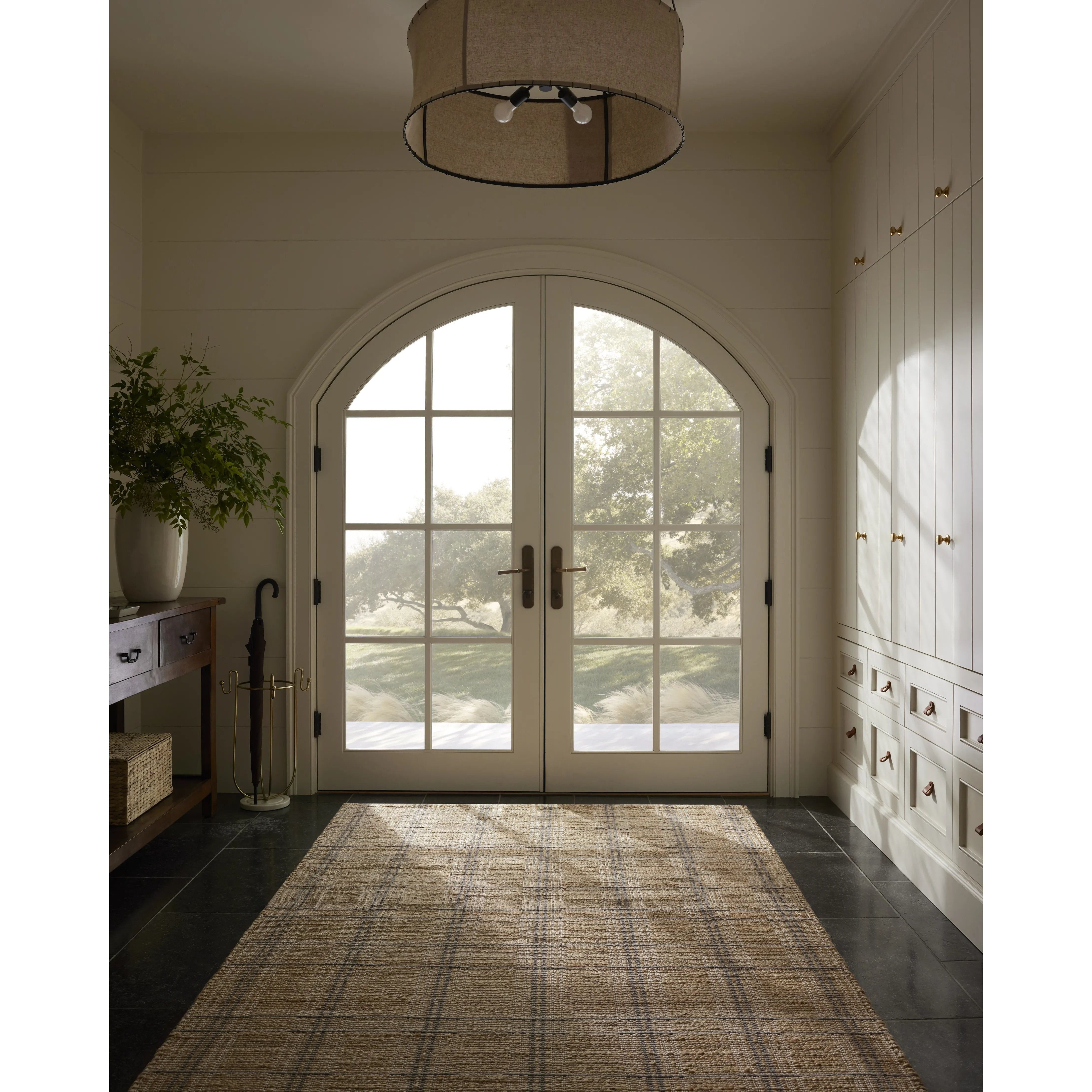 Featuring Chris Loves Julia x Loloi Judy Natural / Stone Rug by Loloi at Amethyst Home. Hand Woven76% Jute l 24% CottonJUD-02 Natural / StonePile Height: 0.5". Amethyst Home provides interior design, new home construction design consulting, vintage area rugs, and lighting in the Laguna Beach metro area.