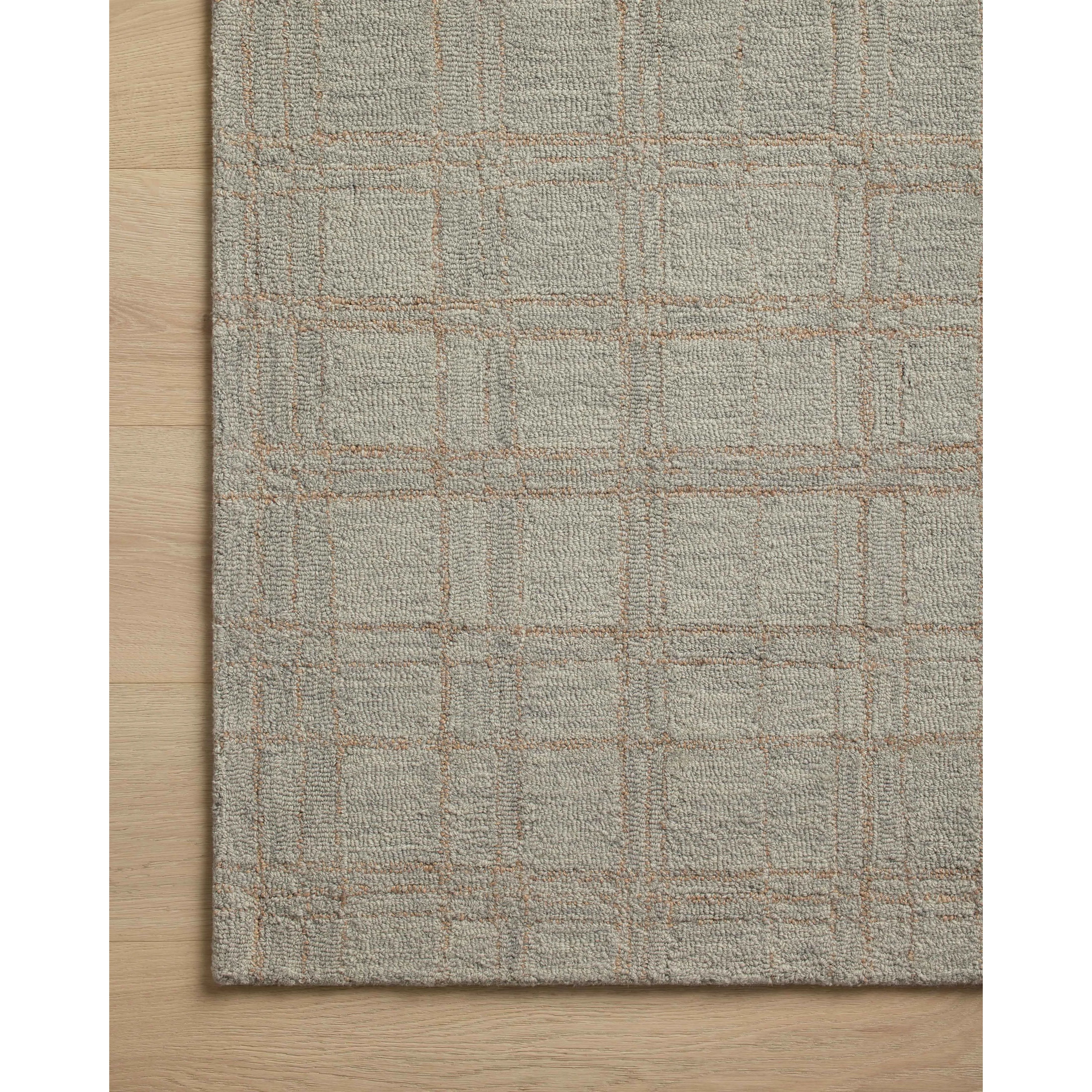 Featuring Chris Loves Julia x Loloi Polly Fog / Wheat Rug by Loloi at Amethyst Home. Hand-tufted of wool and jute pile, the Polly collection for Chris Loves Julia x Loloi brings a fresh take on modern yet classic designs. With striking gridded designs toned down by a neutral color palette, Polly is a timeless choice for any room. Polly is also GoodWeave cert. Amethyst Home provides interior design, new home construction design consulting, vintage area rugs, and lighting in the Portland metro area.