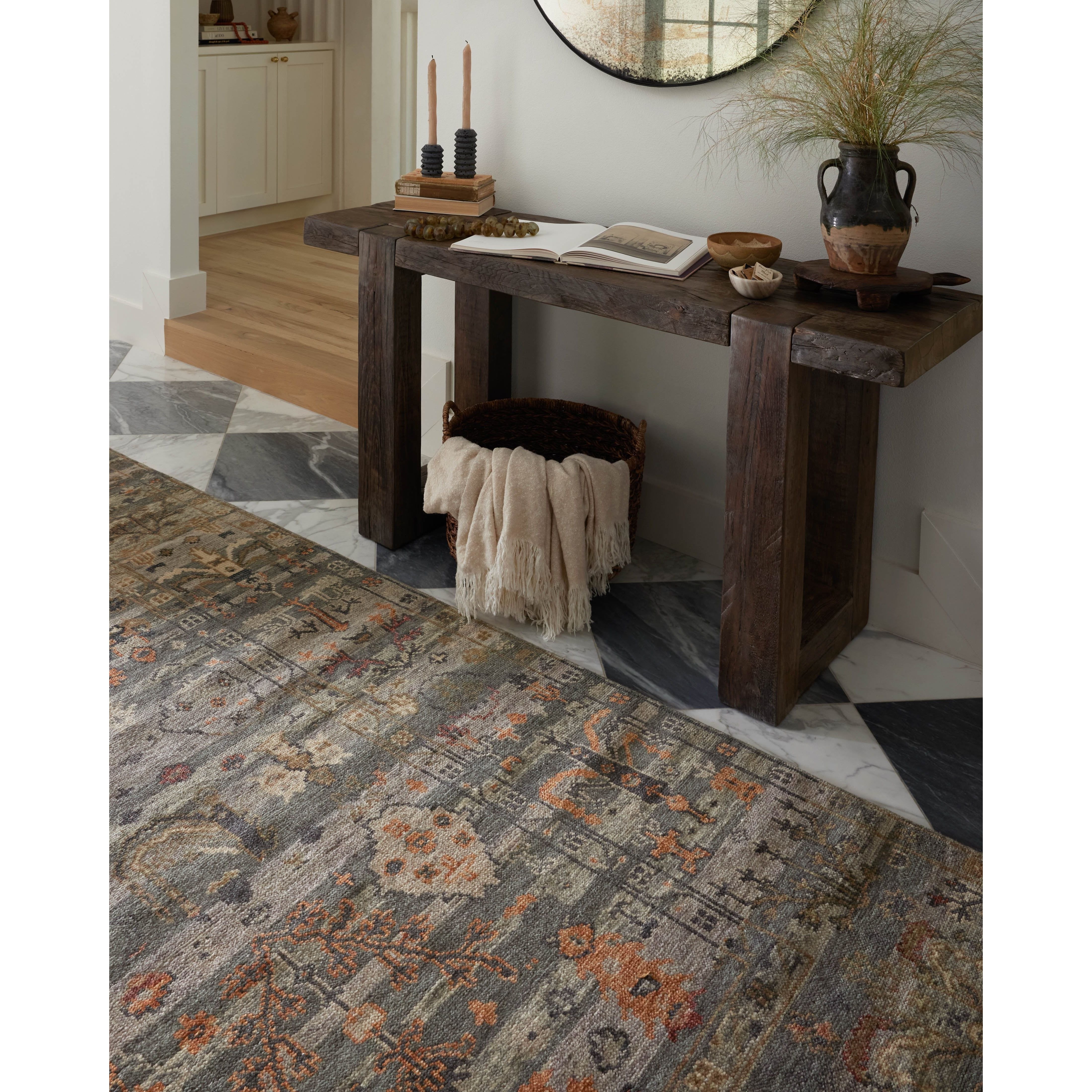 Featuring Dominic Slate / Multi Hand-Knotted Rug by Loloi at Amethyst Home. The hand-knotted Dominic Collection features loose, freeform motifs that give the rug a sense of depth and romance. Dominic’s shade-shifting palette is based on the horizontal lines of varying tones you’d encounter in antique Persian rugs. This GoodWeave certified collection is made of wool and cotton in India, en. Amethyst Home provides interior design, new construction, custom furniture, and rugs for San Diego metro area