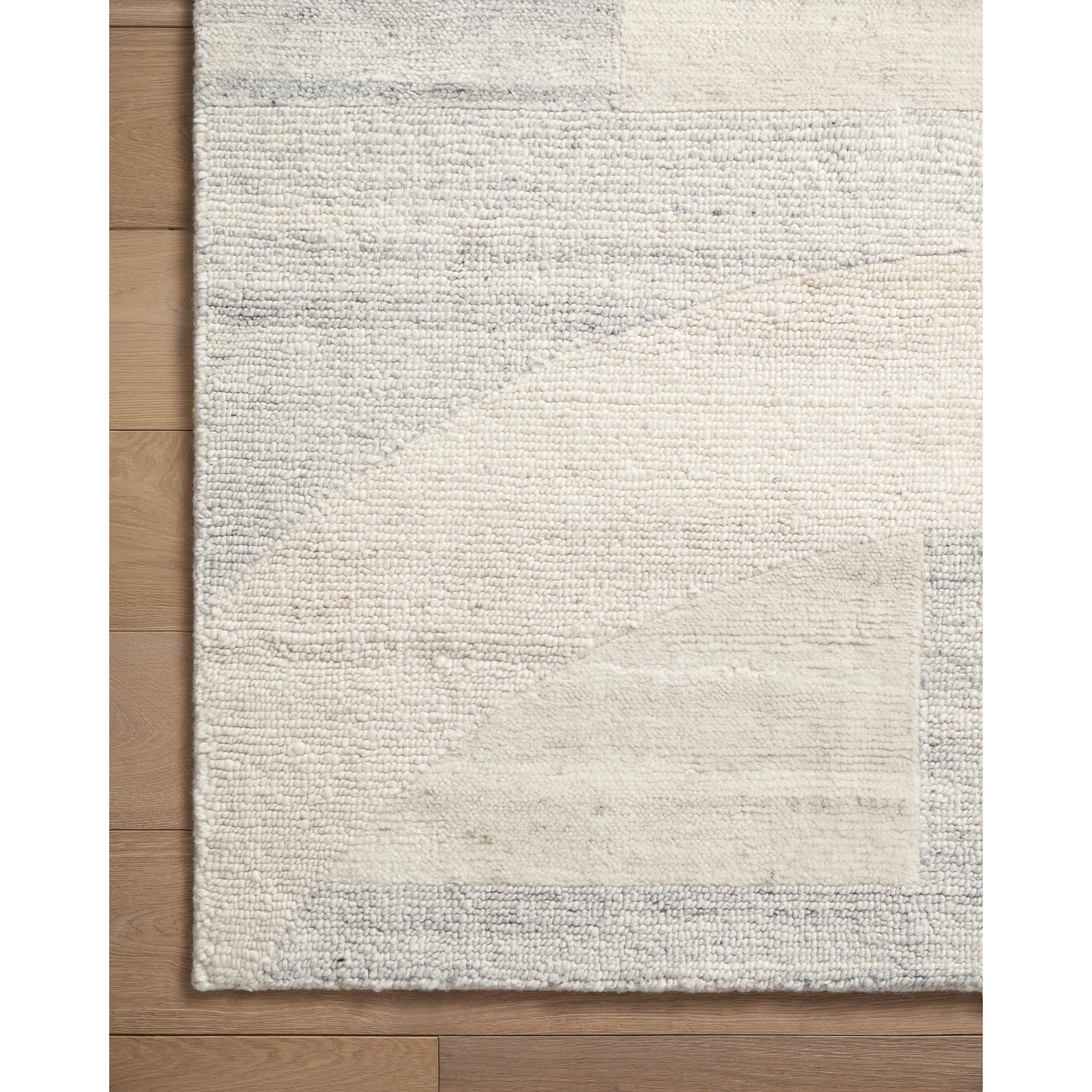 Featuring Elodie Natural / Mist Hand-Knotted Rug by Loloi at Amethyst Home. The hand-knotted Elodie Natural / Mist rug collection uses space-dyed yarns to create dynamic variability in a range of heathered neutrals with a tone-on-tone design. Elodie is also uniquely textured and soft, made of New Zealand wool and nylon blended yarns. A luxurious area rug with a. Amethyst Home provides interior design, new home construction design consulting, vintage area rugs, and lighting in the Omaha metro area.