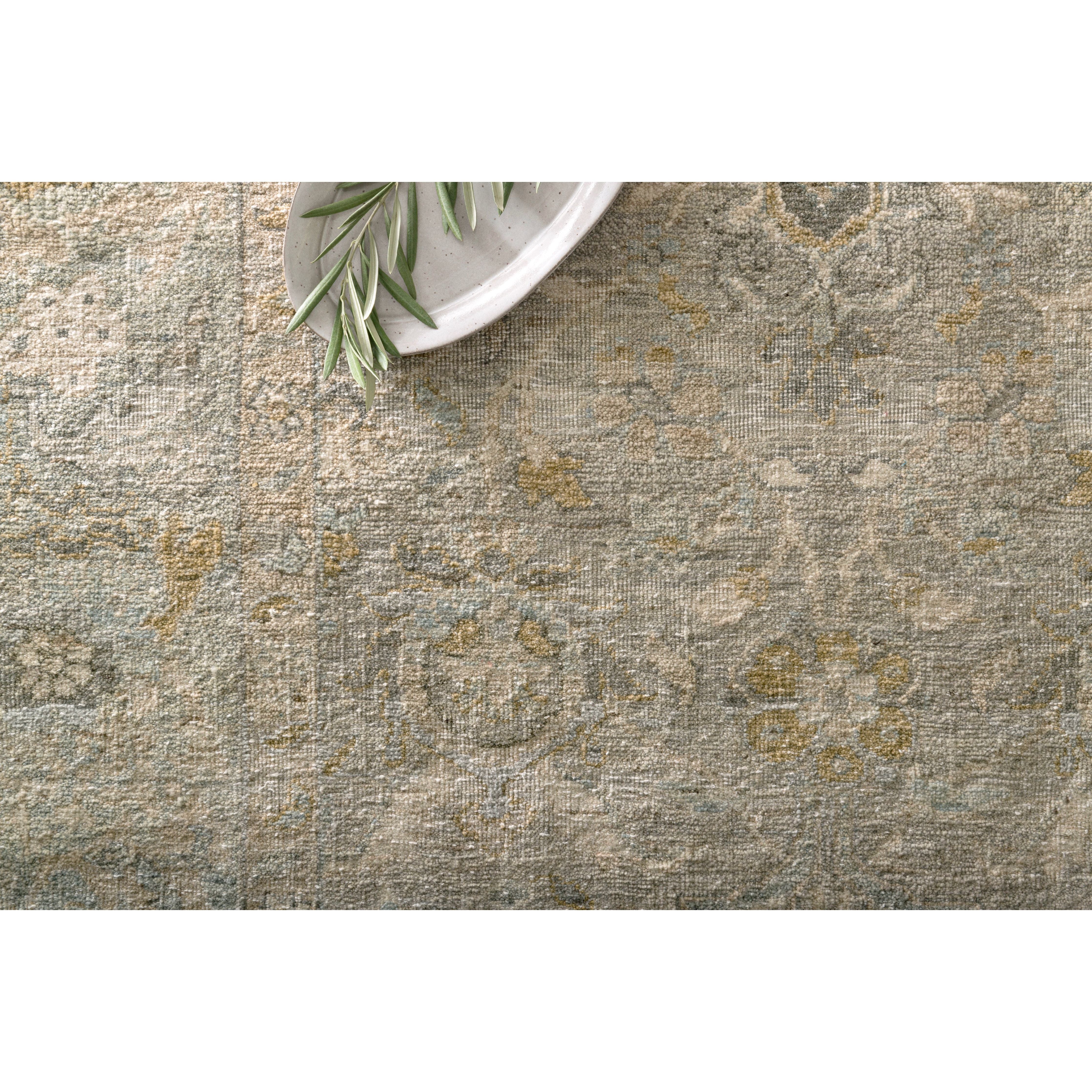 Featuring Legacy Ash/Lagoon Hand-Knotted Rug by Loloi at Amethyst Home. The Legacy Ash/Lagoon rug from Loloi is hand-knotted, refined, yet versatile for any home. The Legacy rug is deliberately distressed and sheared down to an extra low pile of 100% wool, creating a patina usually only imparted through decades of wear.
This rug features:- Beautiful vintage look and. Amethyst Home provides interior design, new construction, custom furniture, and rugs for the Austin, Houston, and Dallas metro area.