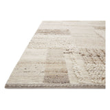 Featuring Manfred Natural / Stone Hand-Knotted Rug by Loloi at Amethyst Home. Each area rug in the Manfred Natural / Stone rug collection is meticulously hand-knotted with a technique that creates a high-low texture, adding visual depth and movement. The rug’s patchwork design is casually sophisticated, fitting into living rooms, bedrooms, and dens—anywhere. Amethyst Home provides interior design, new home construction design consulting, vintage area rugs, and lighting in the Calabasas metro area.