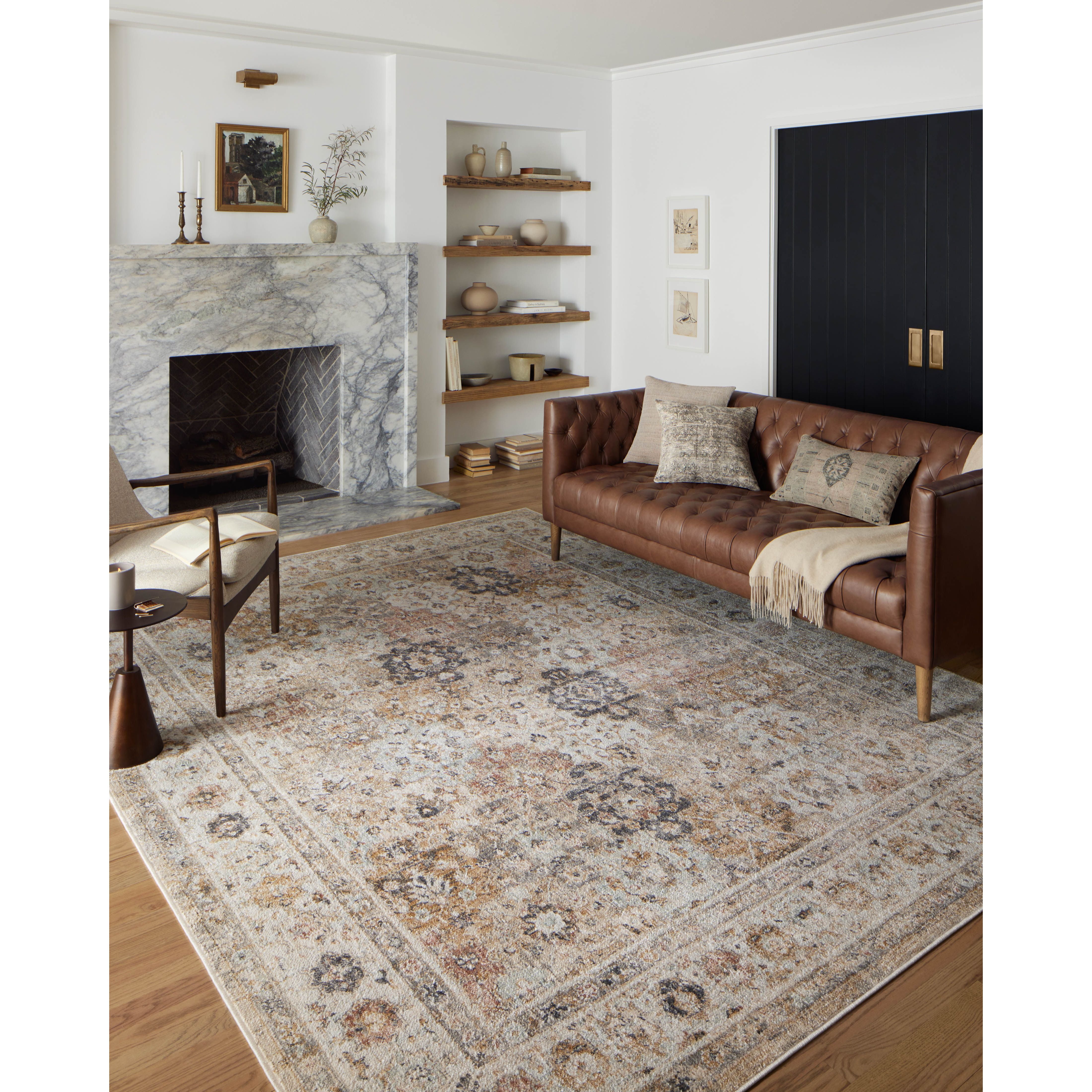 Featuring Monroe Beige / Multi Rug by Loloi at Amethyst Home. Inspired by antique Turkish Oushak carpets with large-scale motifs, the Monroe Beige / Multi Rug modernizes the traditional design in neutral palettes, many of which have black details that anchor the rug in the room. Monroe is power-loomed of 100% polypropylene for easy care and reliable durabil. Amethyst Home provides interior design, new home construction design consulting, vintage area rugs, and lighting in the San Diego metro area.