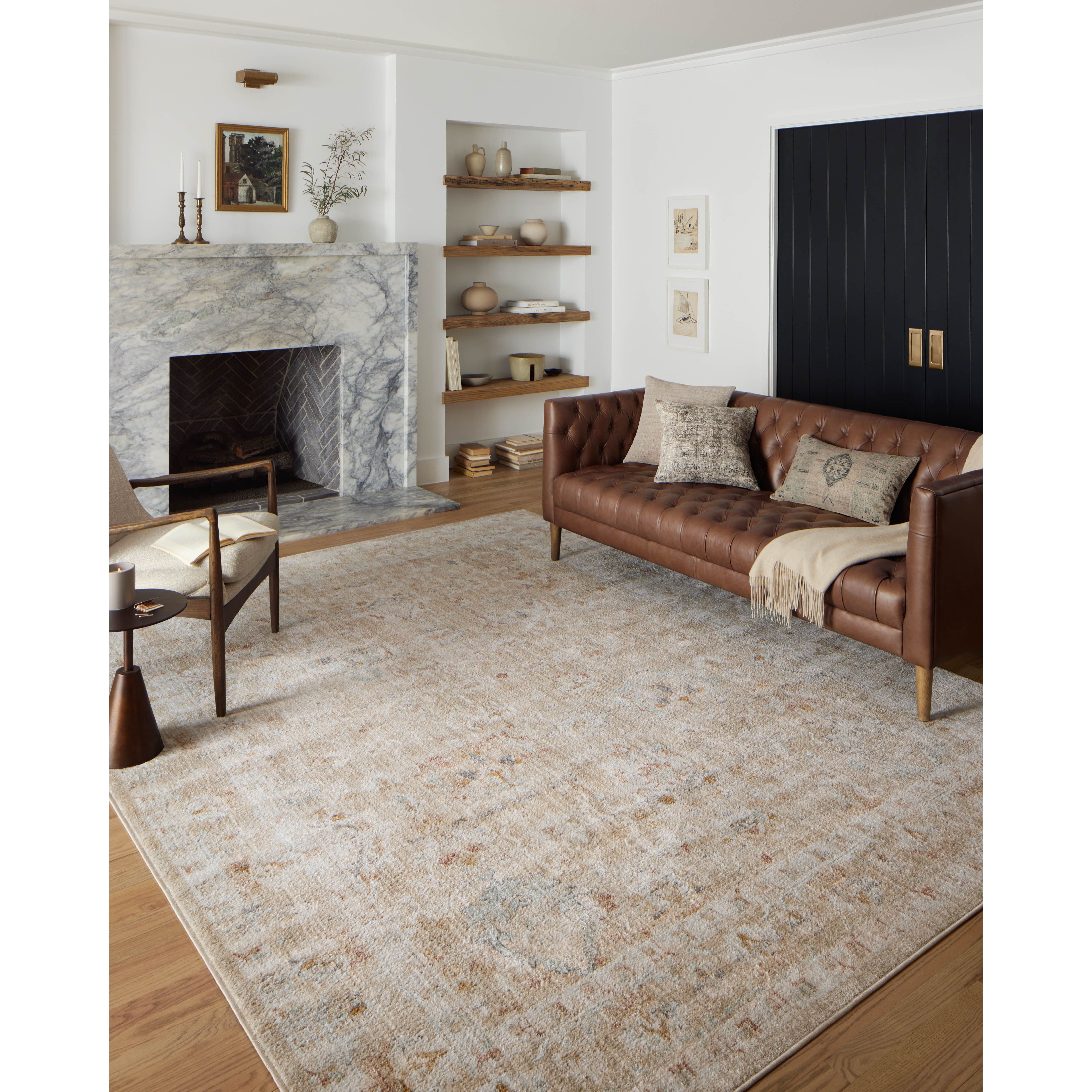 Featuring Monroe Sand / Sunrise Rug by Loloi at Amethyst Home. Inspired by antique Turkish Oushak carpets with large-scale motifs, the Monroe Sand / Sunrise Rug modernizes the traditional design in neutral palettes, many of which have black details that anchor the rug in the room. Monroe is power-loomed of 100% polypropylene for easy care and reliable dura. Amethyst Home provides interior design, new home construction design consulting, vintage area rugs, and lighting in the Alpharetta metro area.