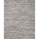 Featuring Raquel Grey / Stone Rug by Loloi at Amethyst Home. The Raquel Collection exemplifies what makes a hand-knotted rug so unique. Each area rug has a ribbed texture and subtle striping created by the artisan’s cut-and-loop technique. Raquel features an organic, asymmetrical linear pattern in an airy, neutral palette. With both an elevated look and feel, t. Amethyst Home provides interior design, new home construction design consulting, vintage area rugs, and lighting in the Tampa metro area.