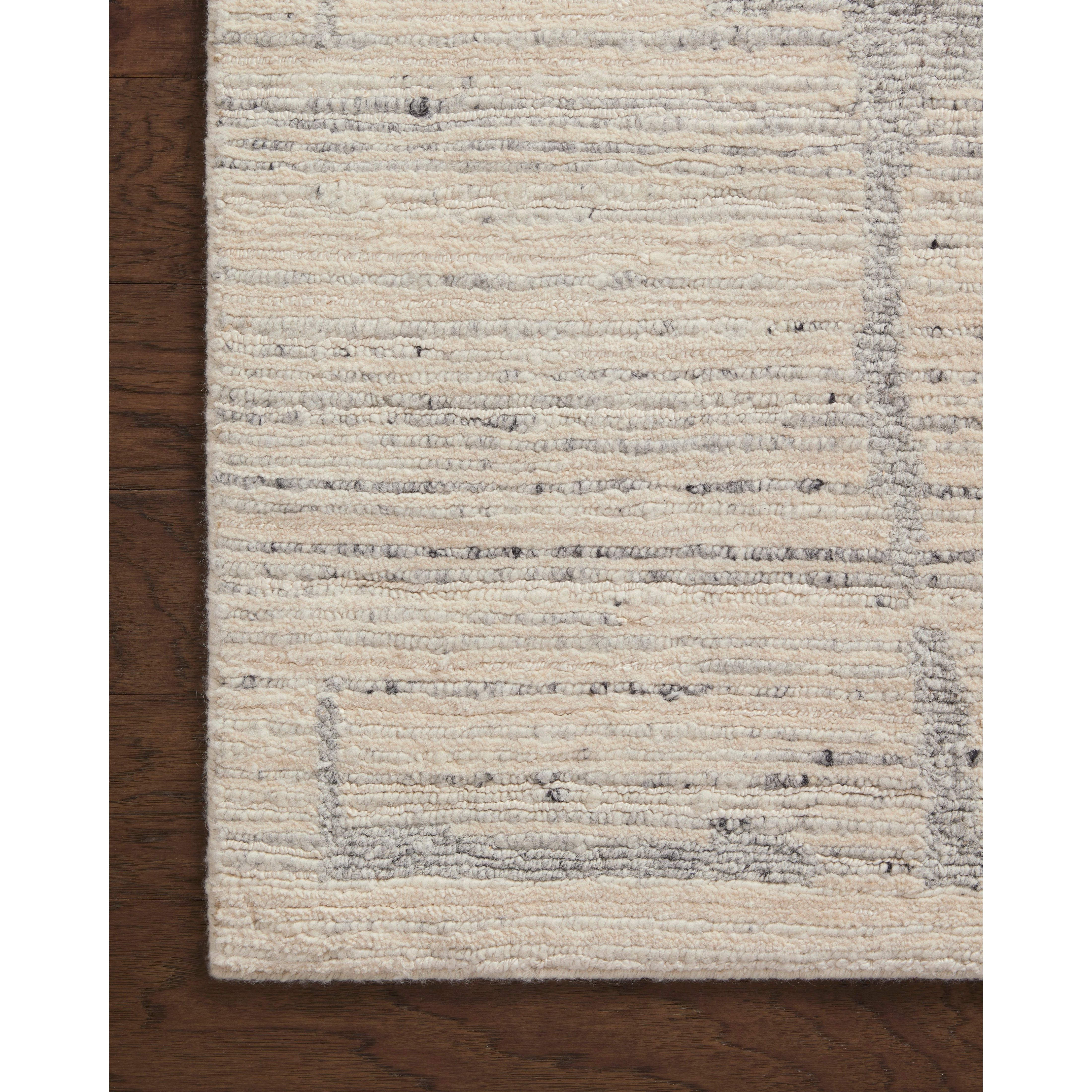 Featuring Raquel Natural / Slate Rug by Loloi at Amethyst Home. The Raquel Collection exemplifies what makes a hand-knotted rug so unique. Each area rug has a ribbed texture and subtle striping created by the artisan’s cut-and-loop technique. Raquel features an organic, asymmetrical linear pattern in an airy, neutral palette. With both an elevated look and . Amethyst Home provides interior design, new home construction design consulting, vintage area rugs, and lighting in the San Diego metro area.
