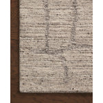 The Raquel Pebble / Granite rug exemplifies what makes a hand-knotted rug so unique. Each area rug has a ribbed texture and subtle striping created by the artisan’s cut-and-loop technique. Raquel features an organic, asymmetrical linear pattern in an airy, neutral palette. Amethyst Home provides interior design, new home construction design consulting, vintage area rugs, and lighting in the Miami metro area.