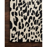 Featuring Masai Black/Ivory Rug by Loloi at Amethyst Home. Hooked of 100% wool, this Masai Collection is a softer side of the savannah brought to life by artisans in India. Masai is a beautiful contemporary rug with contrasting hues and is a chic twist on the classic animal print.
Hooked100% WoolMAS-02 Black / Ivory
Clean spills immediately by blotting wit.  Amethyst Home provides interior design, new home construction design consulting, vintage area rugs, and lighting in the Nashville metro area.