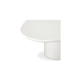 The Eden coffee table features a rounded triangular shape and oval pedestal base, creating a scultural silhouette that exudes modern sophistication. An ivory white and black high gloss finishes this coffee table's surface, reflecting light, brightening and opening up any space Amethyst Home provides interior design, new home construction design consulting, vintage area rugs, and lighting in the Austin metro area.