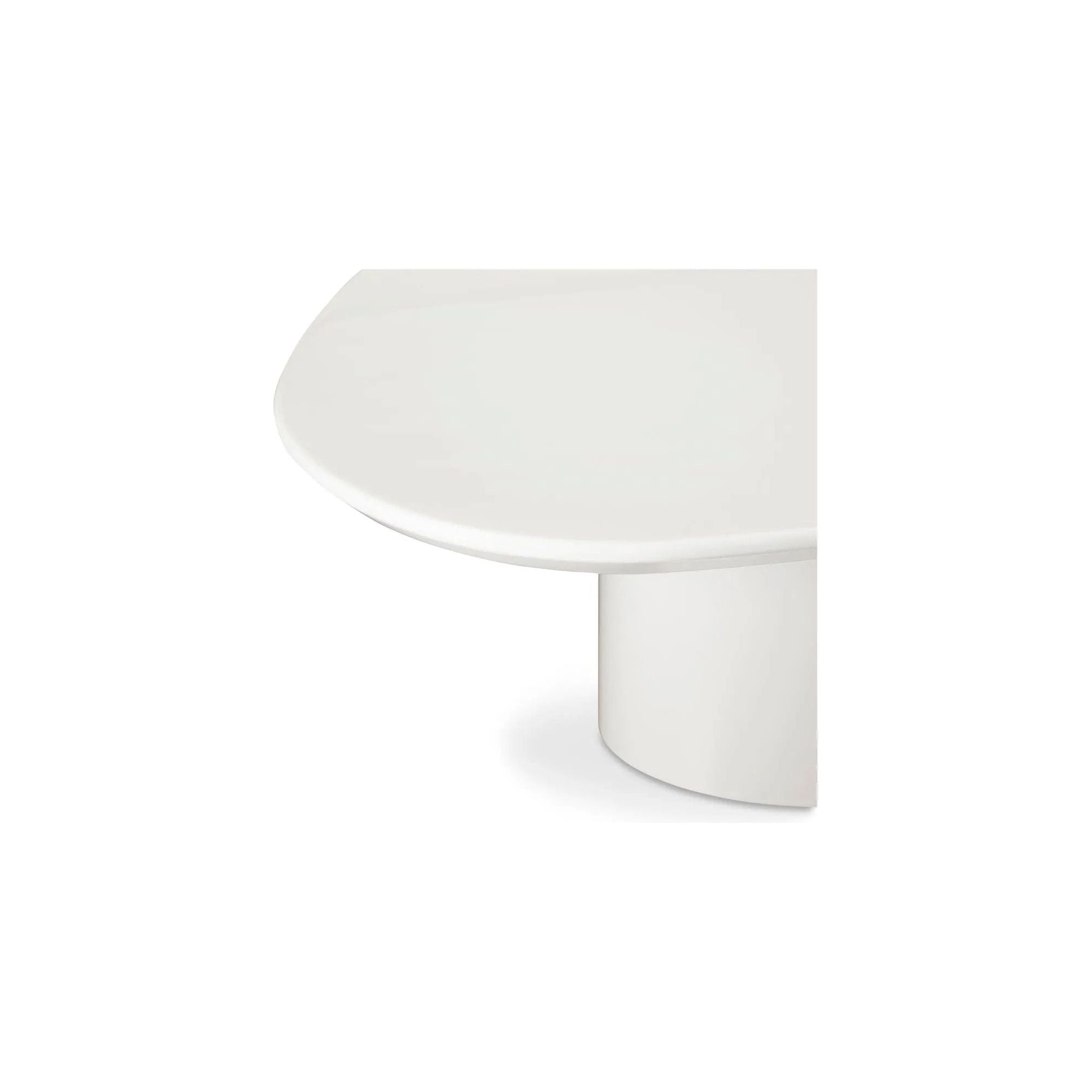 The Eden coffee table features a rounded triangular shape and oval pedestal base, creating a scultural silhouette that exudes modern sophistication. An ivory white and black high gloss finishes this coffee table's surface, reflecting light, brightening and opening up any space Amethyst Home provides interior design, new home construction design consulting, vintage area rugs, and lighting in the Austin metro area.