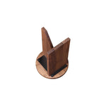 The Grace accent table introduces serenity to any space with its effortless elegance. A timeless sculpture crafted from solid walnut, the table's geometric shapes reveal the raw, natural beauty of the wood while still offering sleek versatility. Amethyst Home provides interior design, new home construction design consulting, vintage area rugs, and lighting in the Kansas City metro area.