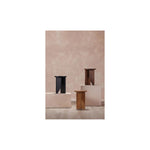 The Grace accent table introduces serenity to any space with its effortless elegance. A timeless sculpture crafted from solid walnut, the table's geometric shapes reveal the raw, natural beauty of the wood while still offering sleek versatility. Amethyst Home provides interior design, new home construction design consulting, vintage area rugs, and lighting in the Monterey metro area.