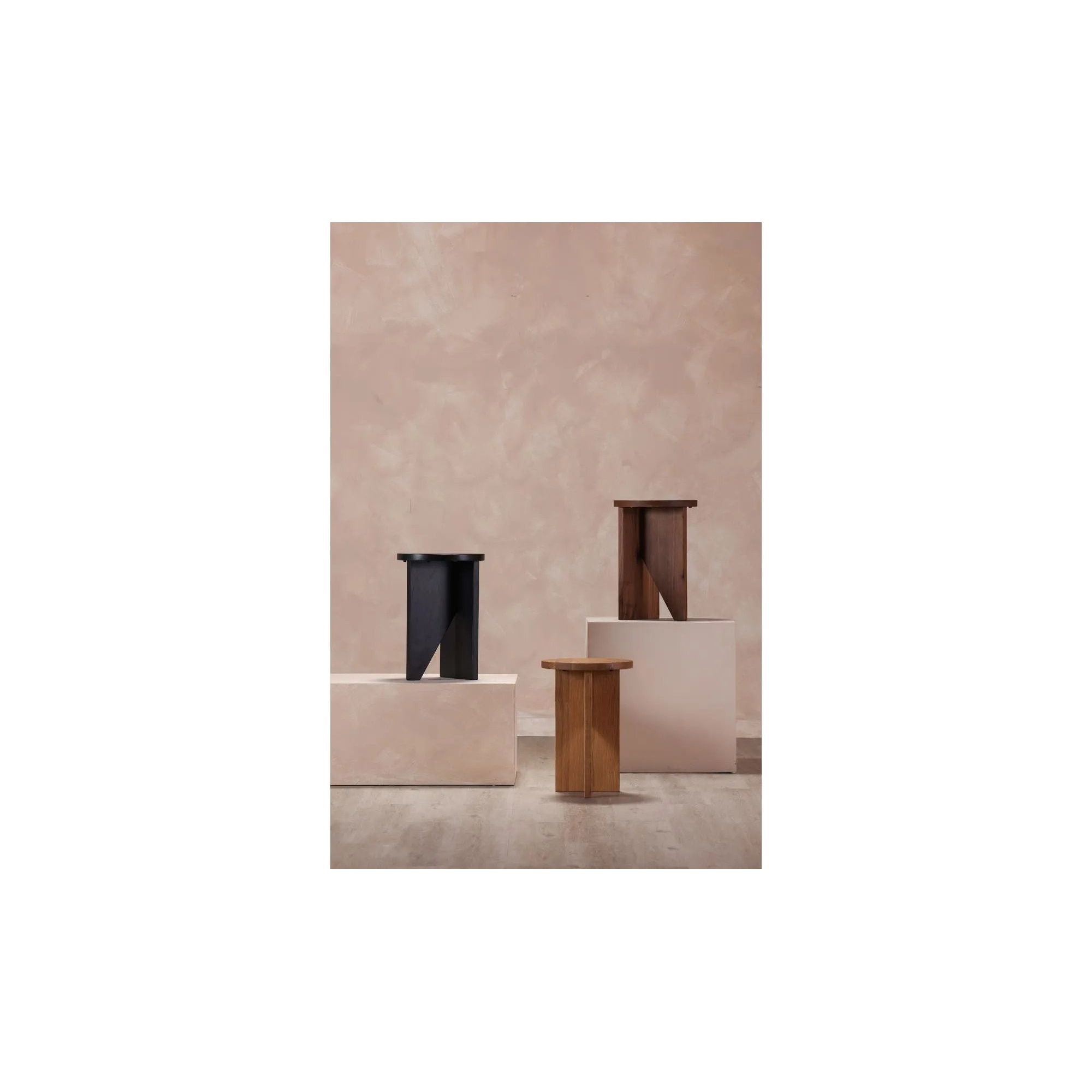 The Grace accent table introduces serenity to any space with its effortless elegance. A timeless sculpture crafted from solid walnut, the table's geometric shapes reveal the raw, natural beauty of the wood while still offering sleek versatility. Amethyst Home provides interior design, new home construction design consulting, vintage area rugs, and lighting in the Monterey metro area.