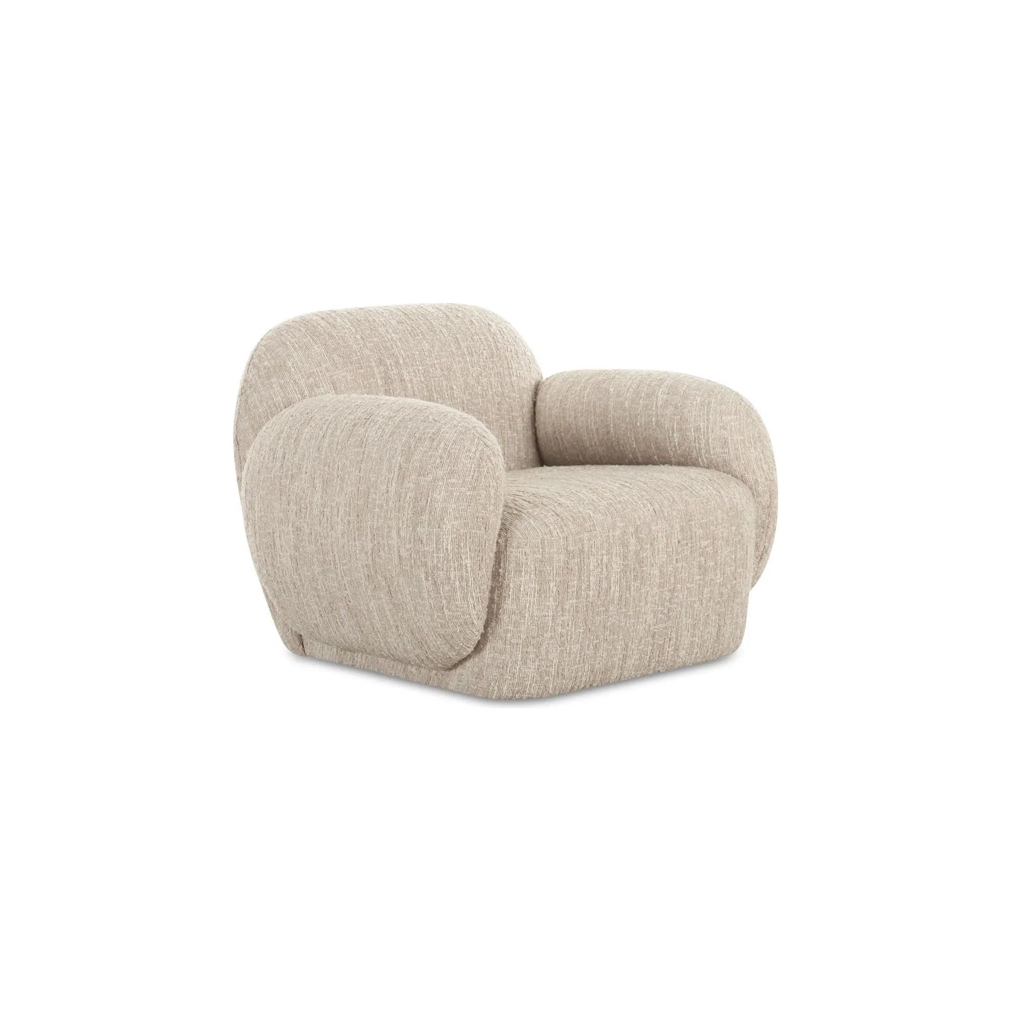 The Hazel lounge chair embraces minimalist, understated elegance with its low-profile, modernist silhouette. Wrapped in exaggerated boucle fabric, it offers a distinct tactility and comfort. The bold, curved arm design makes a stylish statement, harmonizing with the sleek form to create an inviting focal point in any setting Amethyst Home provides interior design, new home construction design consulting, vintage area rugs, and lighting in the Park City metro area.