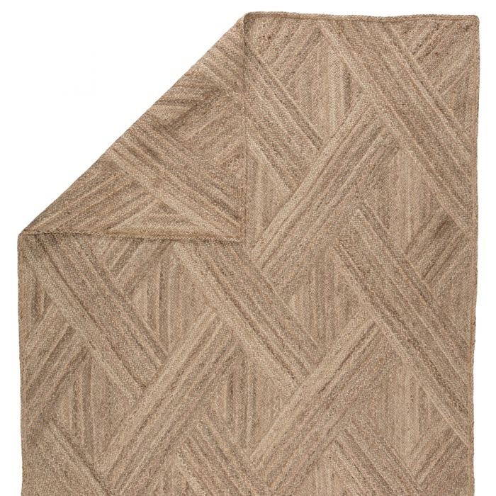 Featuring Naturals Tobago Vero Rug by Jaipur Living at Amethyst Home. The Naturals Tobago Vero rug from Jaipur Living delivers rich texture and organic allure to contemporary homes. The Vero area rug showcases a distinctive diagonal weave design, hand woven of jute. The warm colors of honey and tan of this stunning natural jute rug lends a grounding, boh.  Amethyst Home provides interior design, new home construction design consulting, vintage area rugs, and lighting in the Los Angeles metro area.