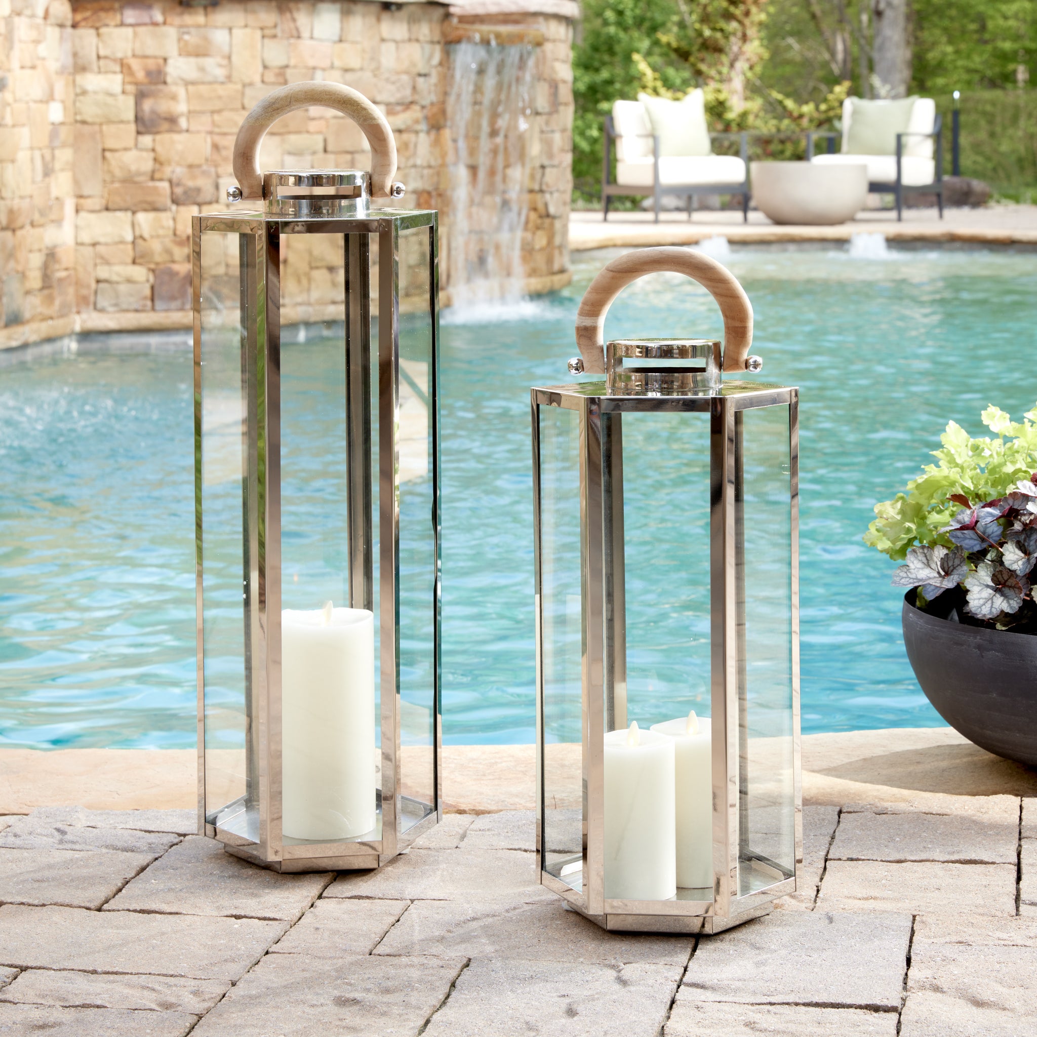 This six panel lantern is made of stainless steel and natural teak handles. Impressive in scale, it is a great accent along the mantle, or on an entry console. Amethyst Home provides interior design, new construction, custom furniture, and area rugs in the Des Moines metro area.